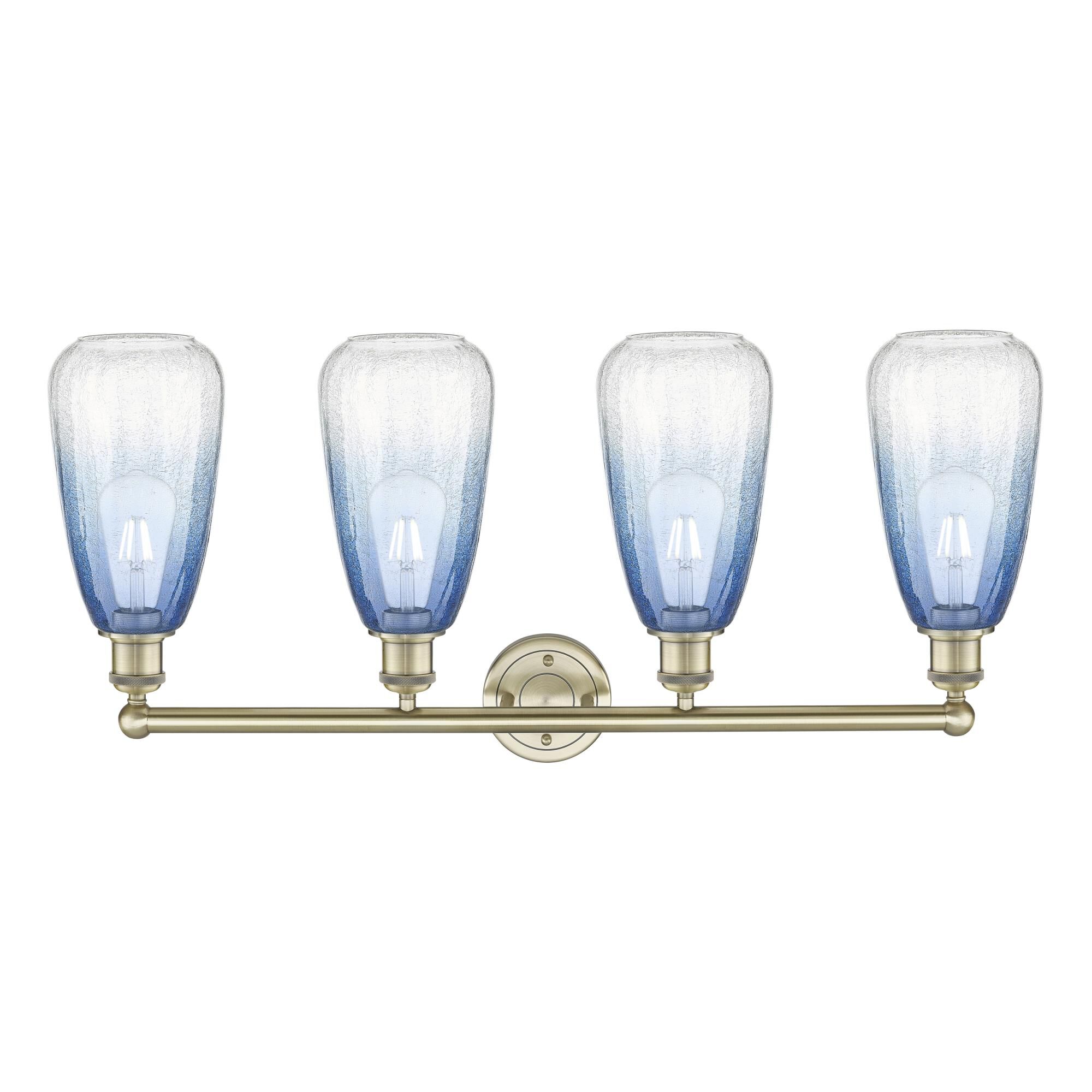 Shown in Antique Brass finish and Sapphire Blue glass