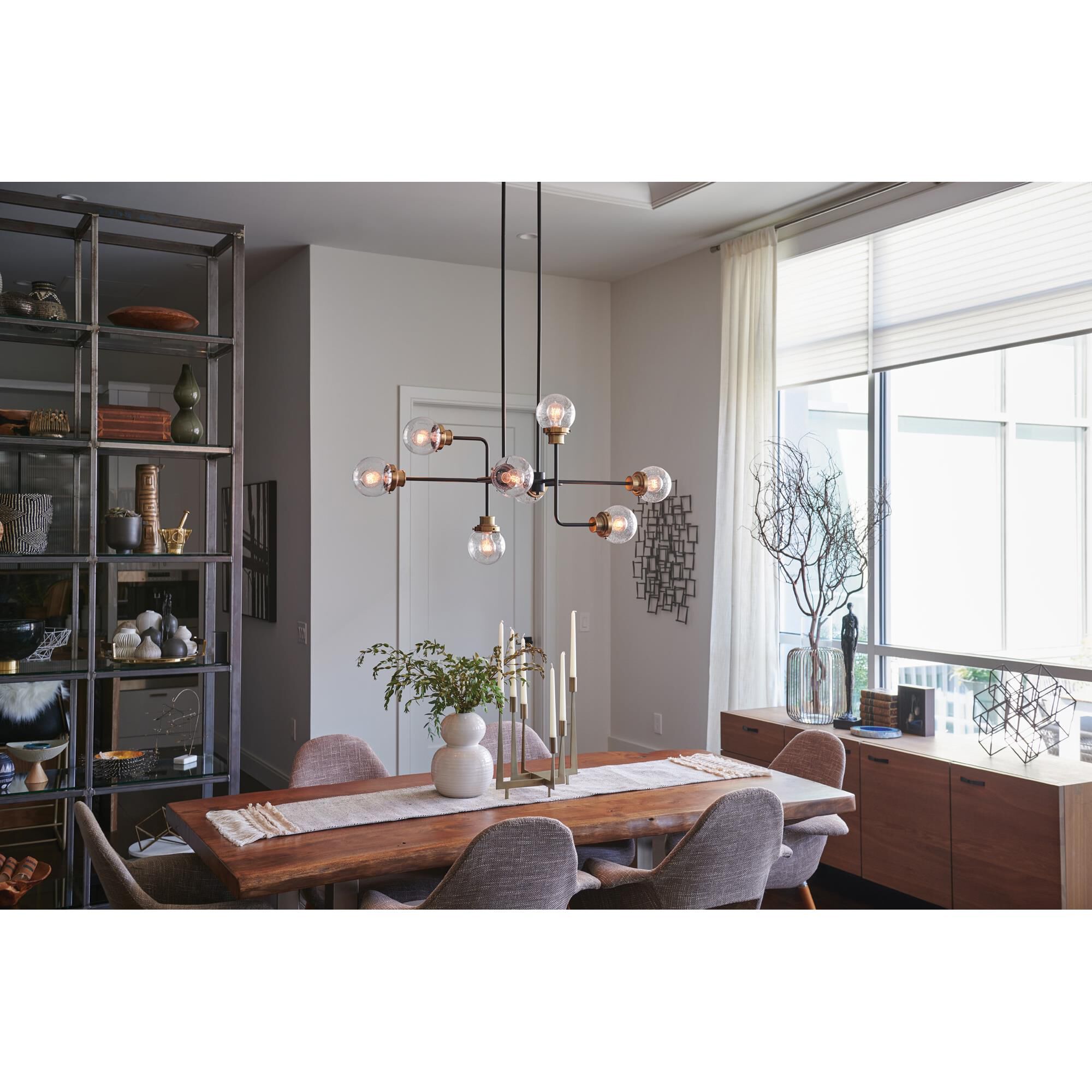 Shown in Black finish and Clear Seedy glass and Heritage Brass accent
