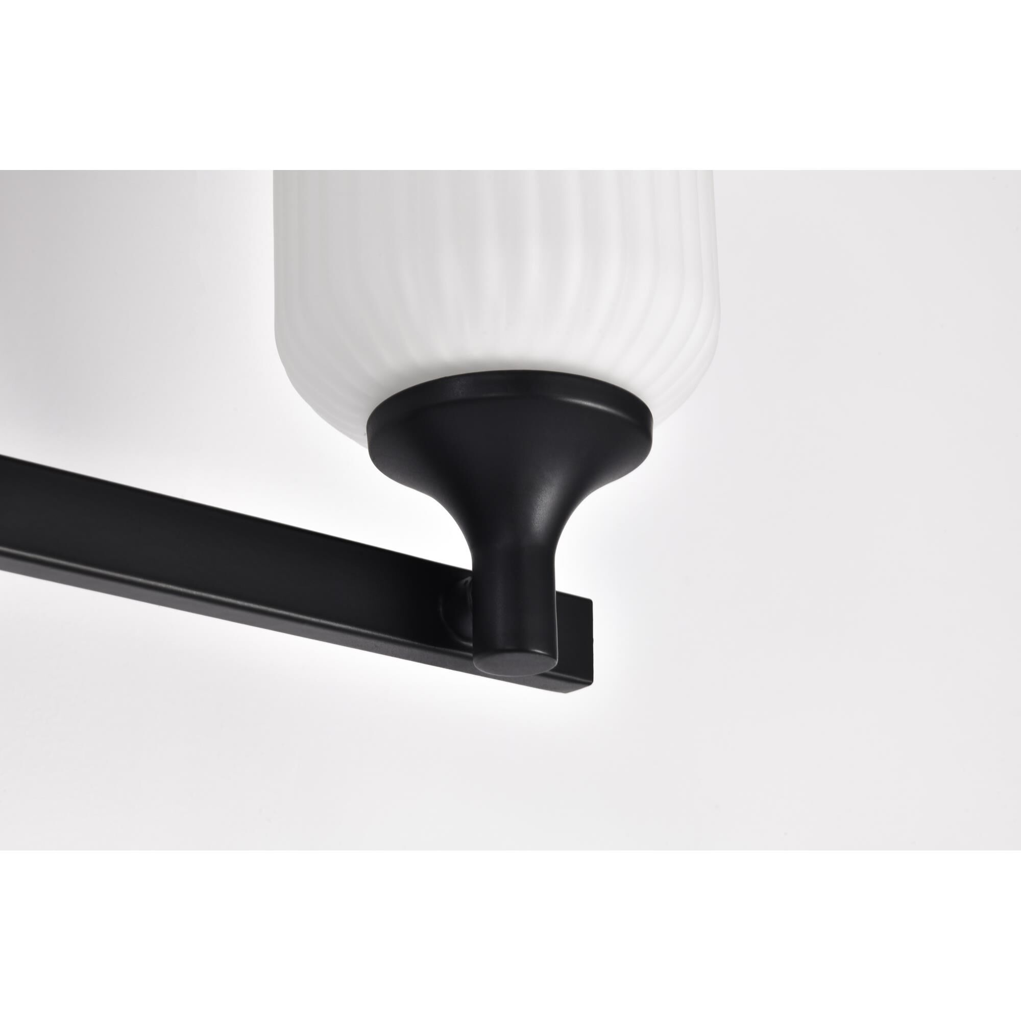 Shown in Matte Black finish and Frosted Ribbed glass