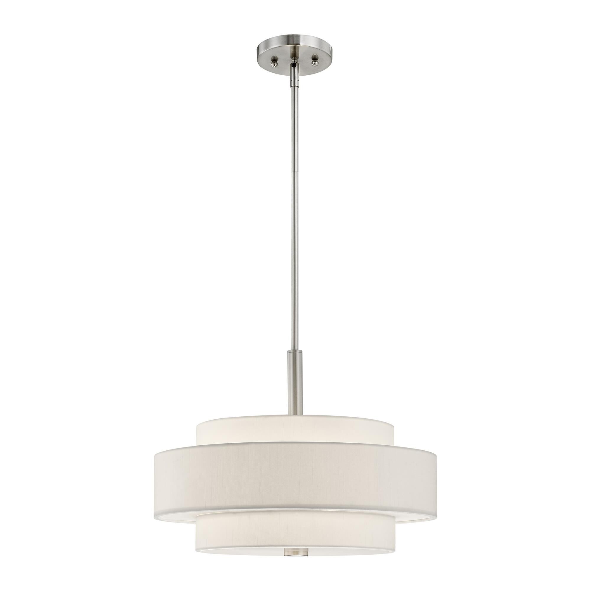 Shown in Brushed Nickel finish and Hand Crafted Off-White Fabric Hardback shade