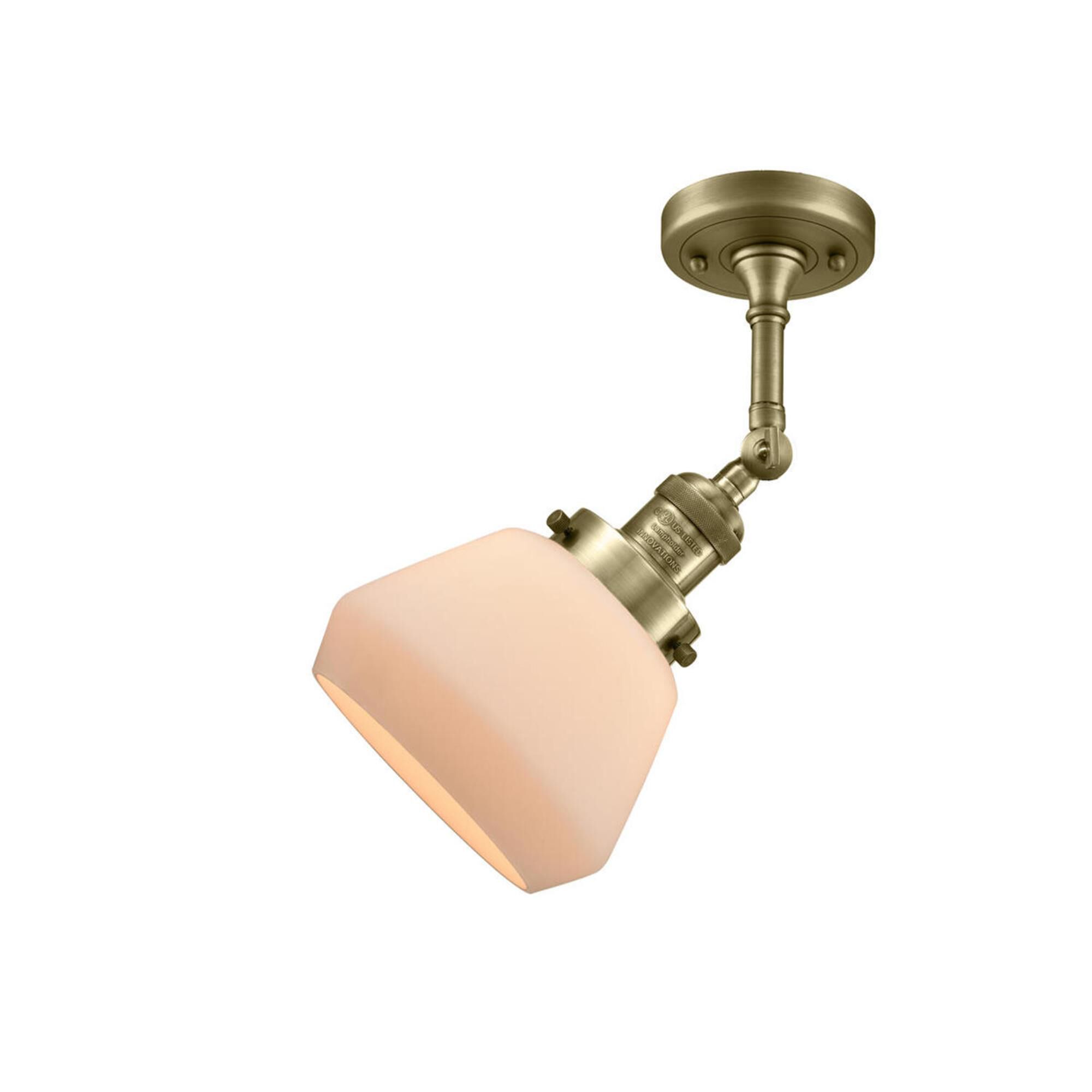 Shown in Antique Brass finish and Matte White Cased glass and No Accent accent