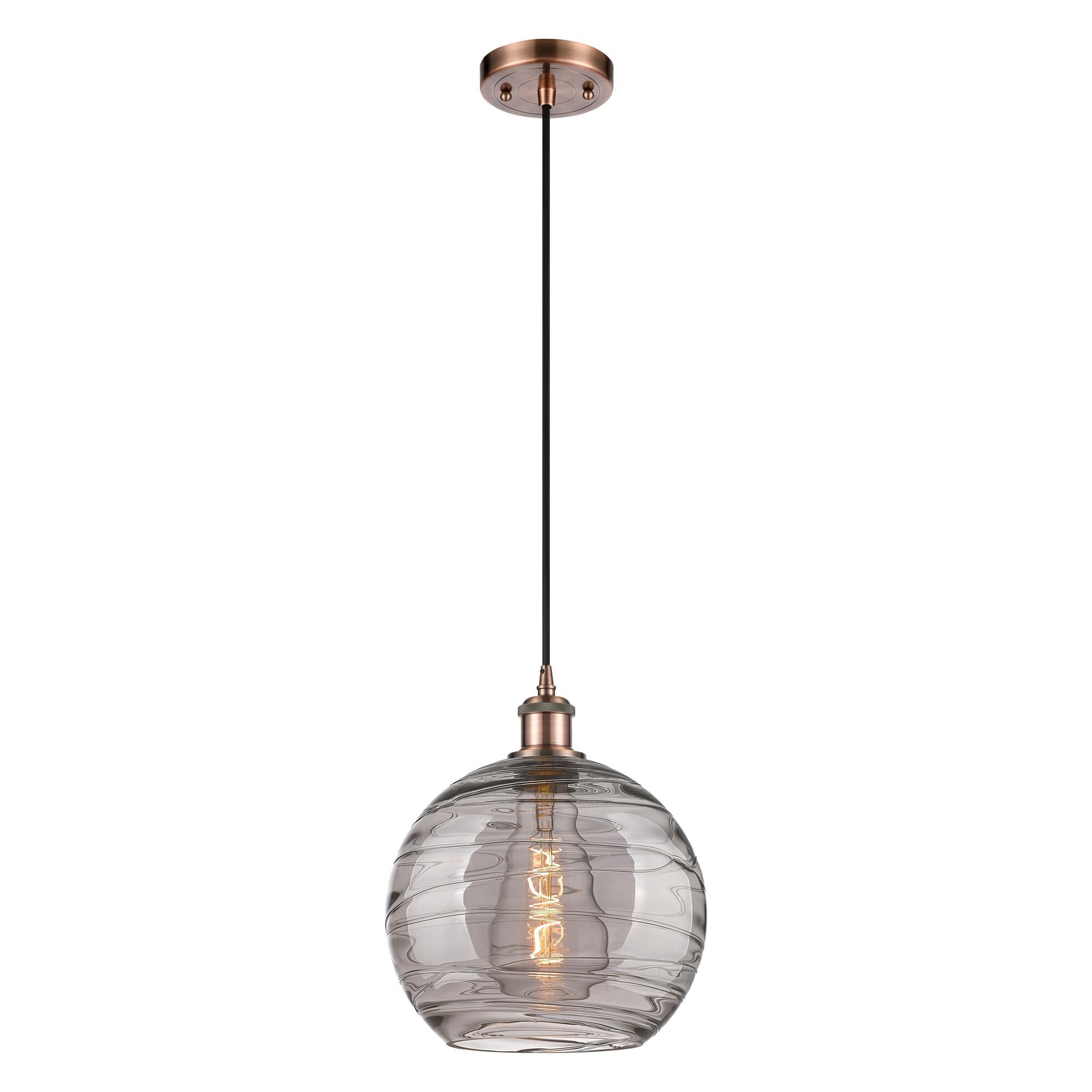 Shown in Antique Copper finish and Light Smoke Deco Swirl glass