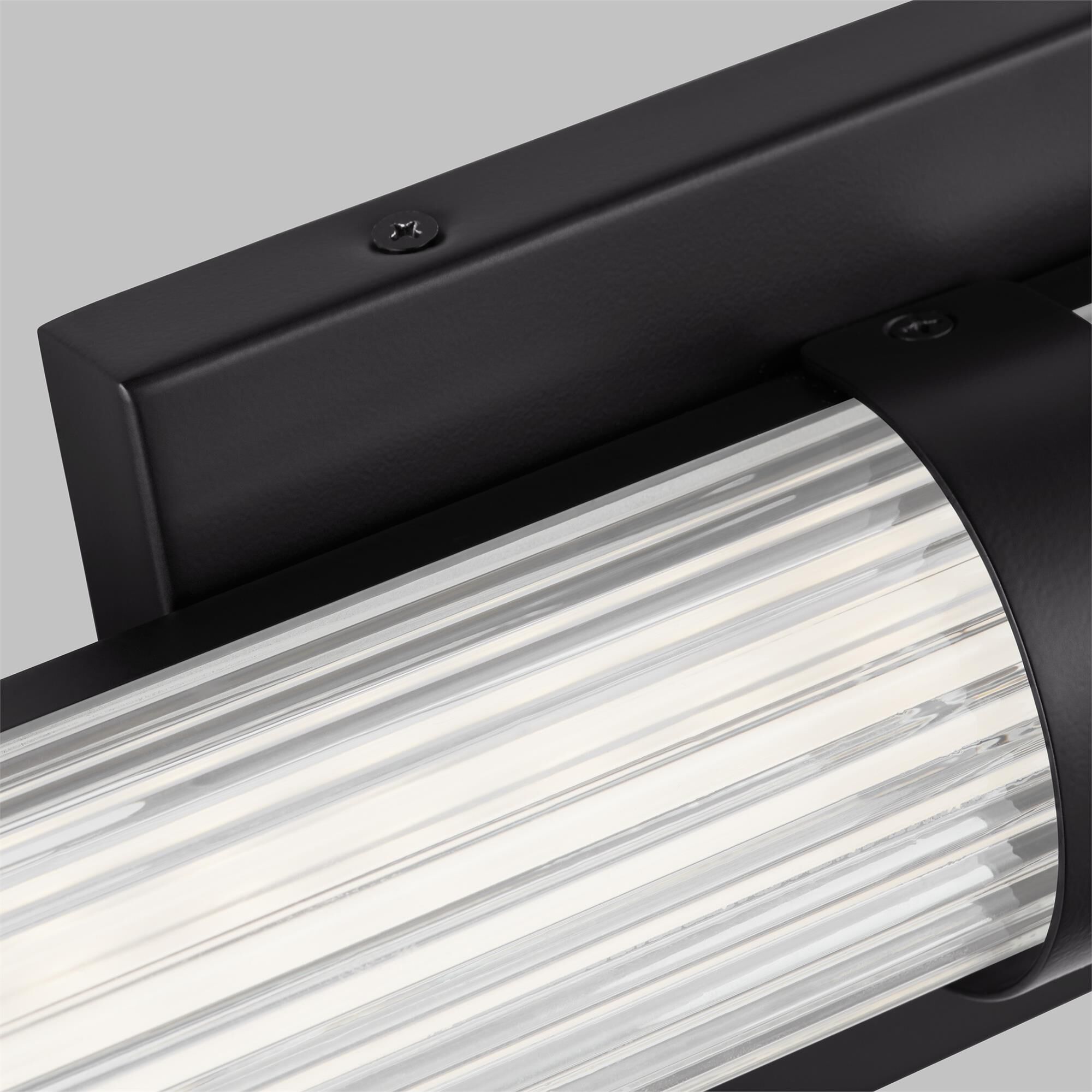 Shown in Midnight Black finish and Frosted glass and Frosted Acrylic Diffuser And Clear Fluted Glass shade
