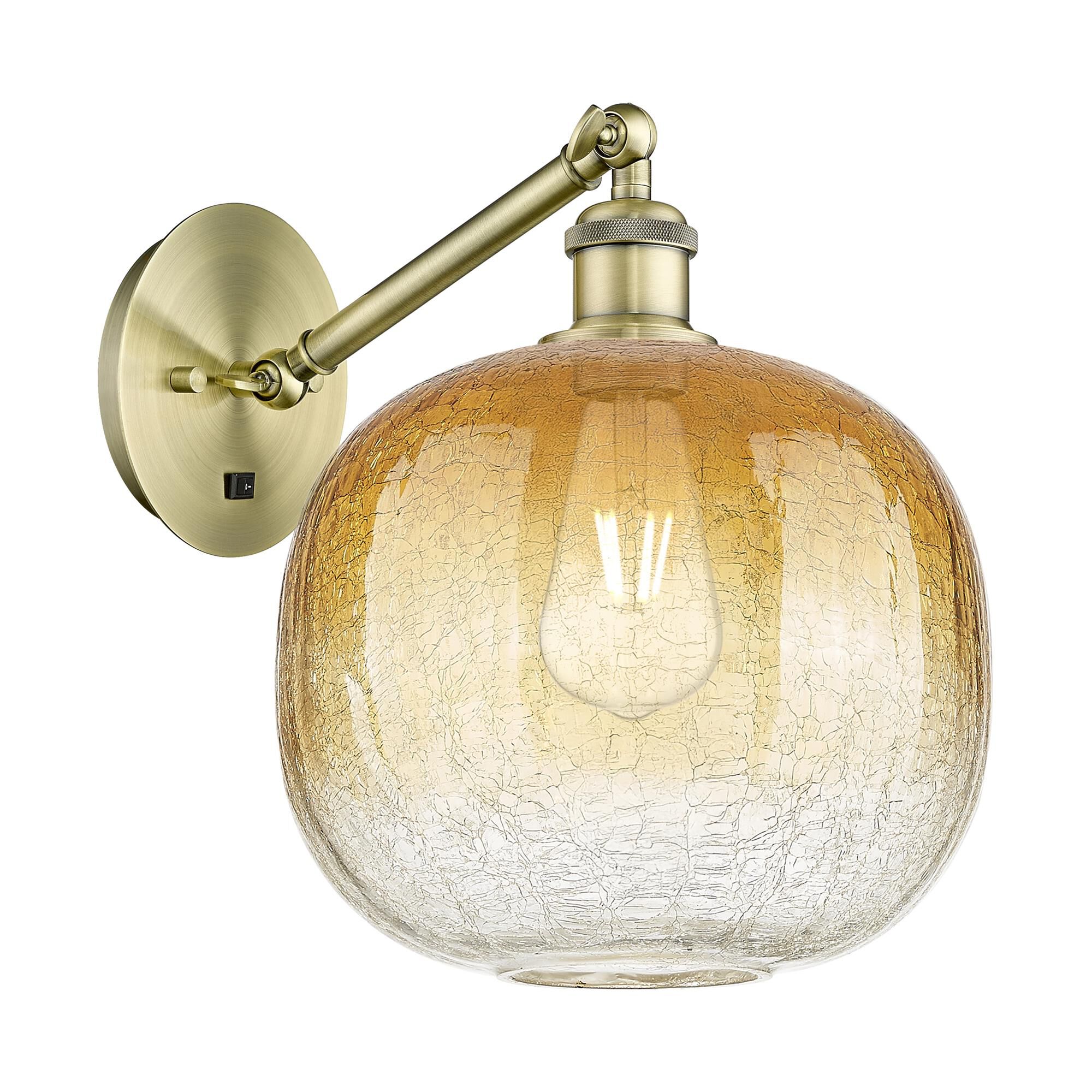 Shown in Antique Brass finish and Amber glass