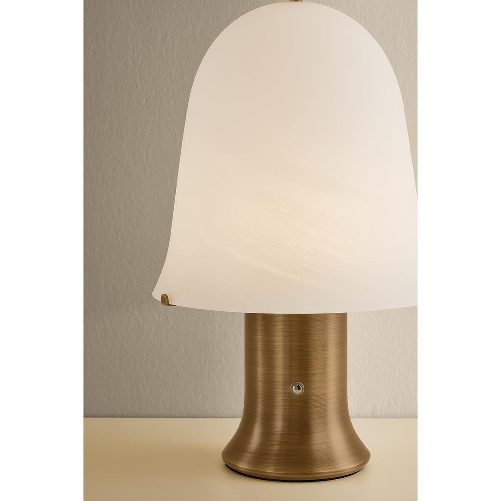 Shown in Patina Brass finish and Matte Cloud glass