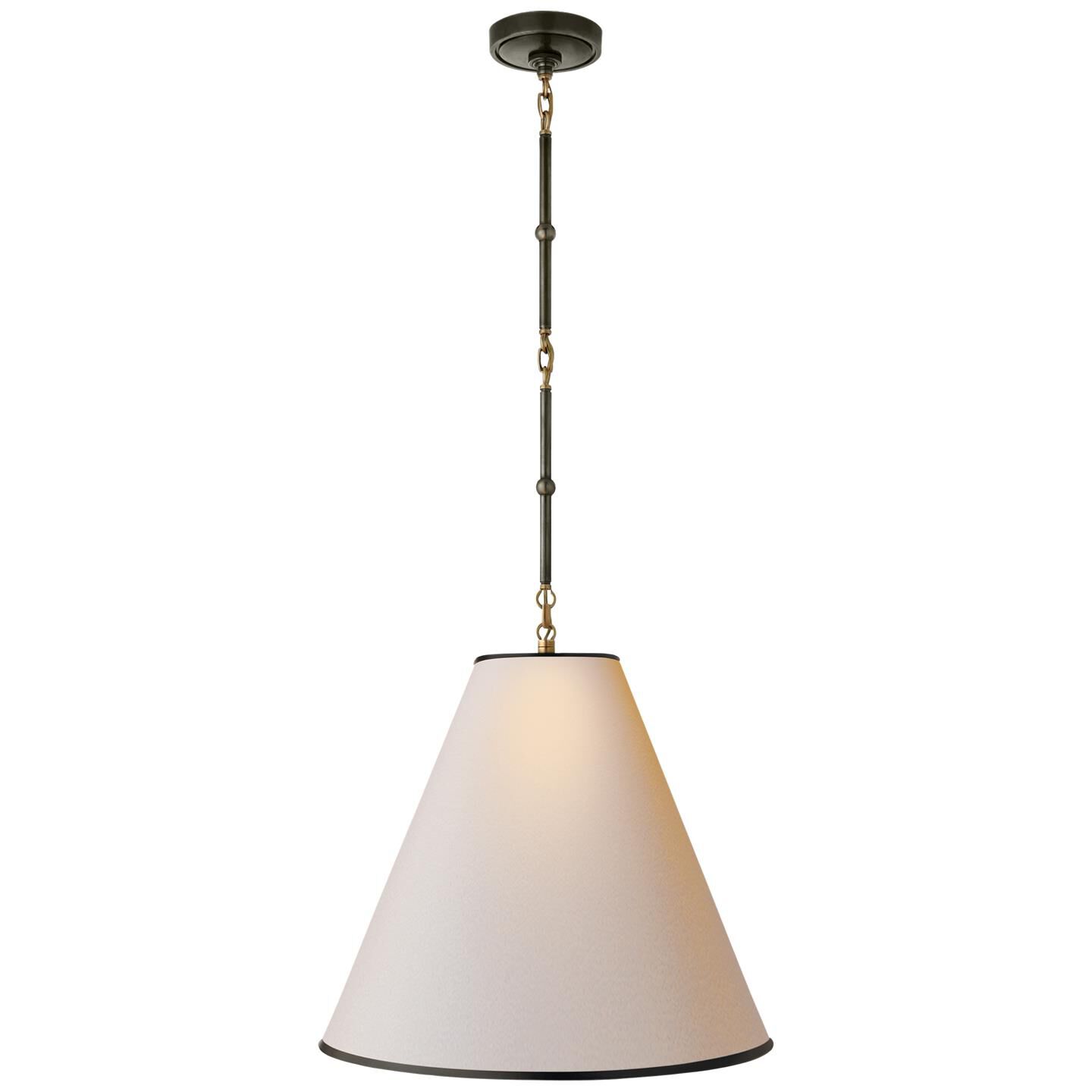 Shown in Bronze With Antique Brass finish and Natural Paper With Black Trim shade 