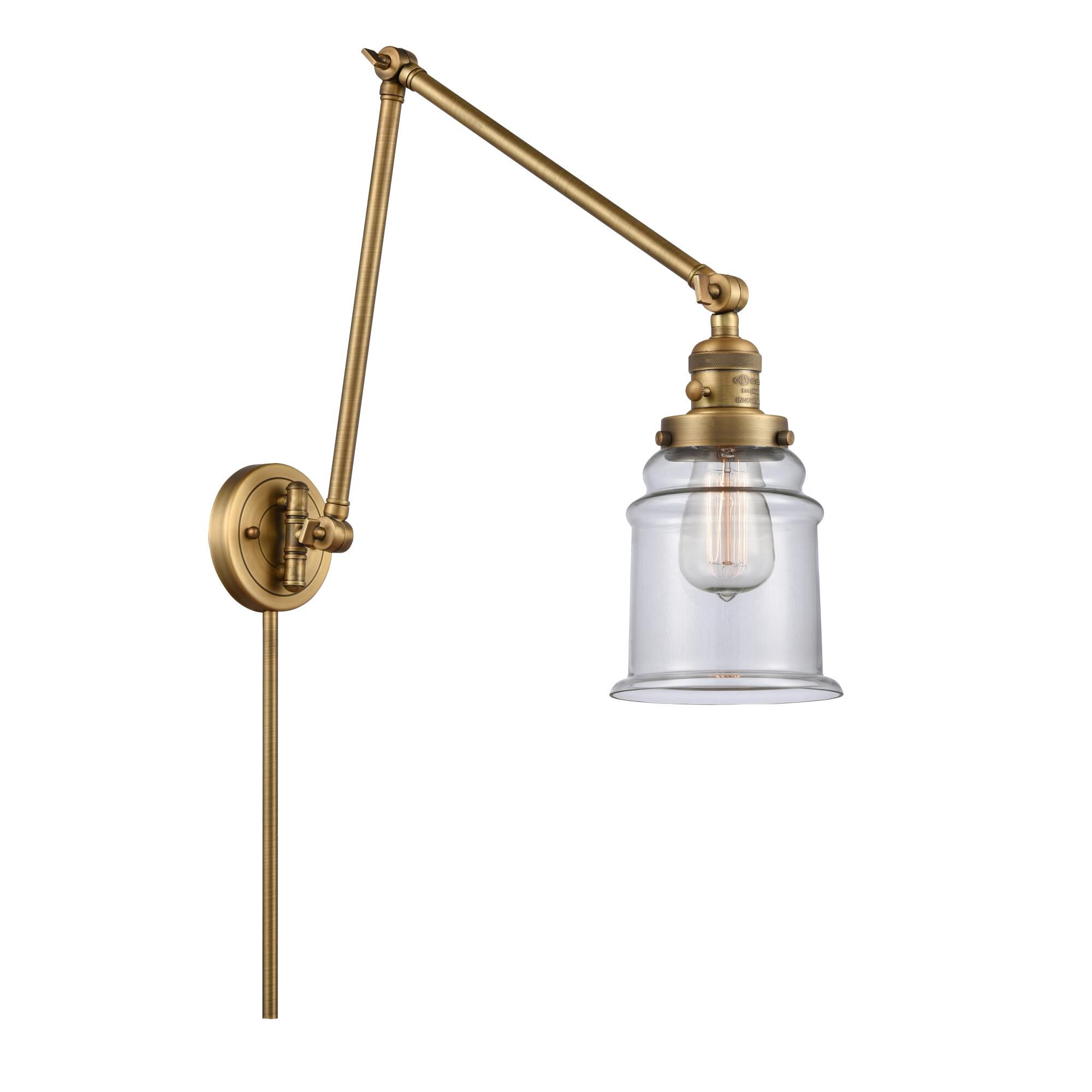 Shown in Brushed Brass finish and Clear Canton glass