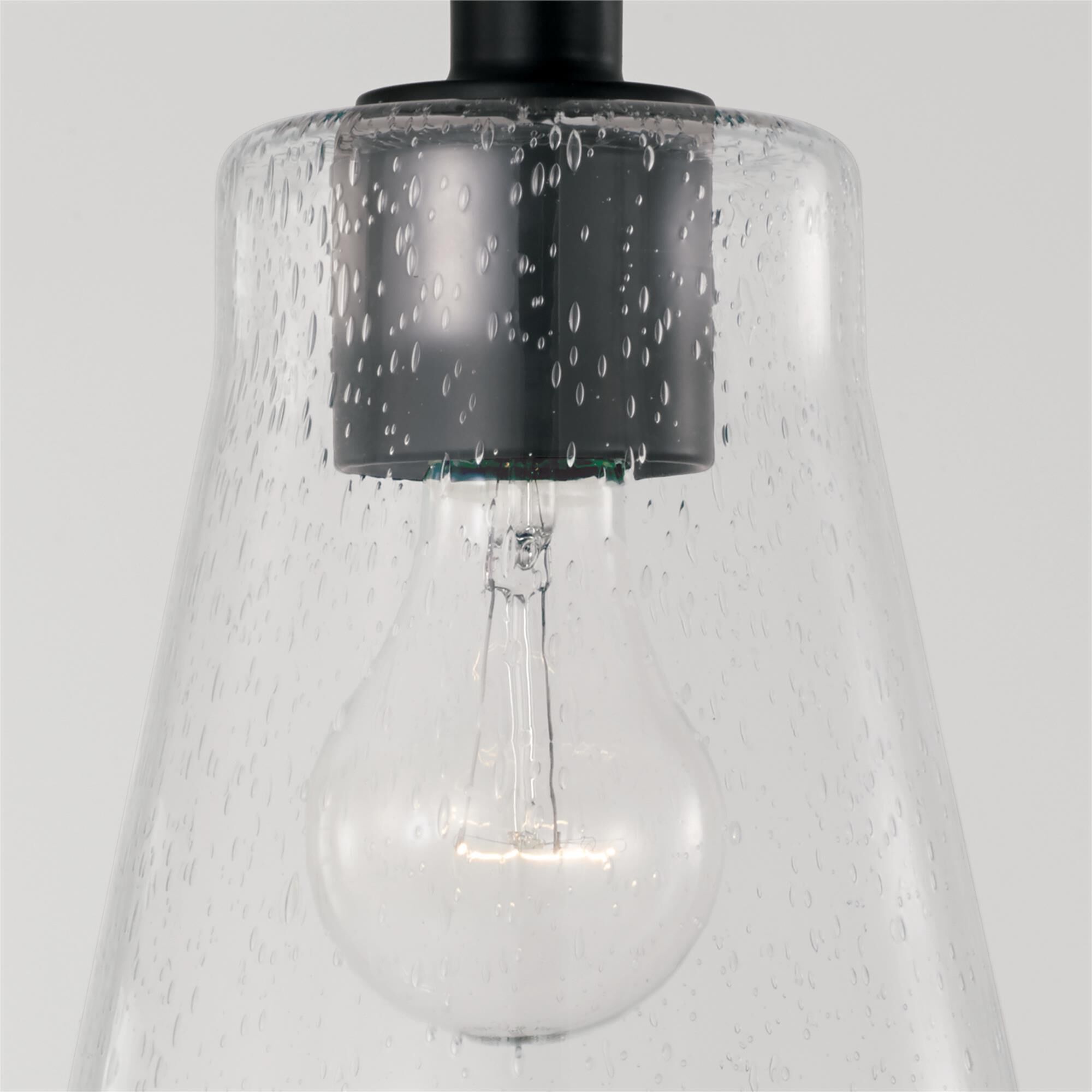Shown in Matte Black finish and Clear Seeded glass
