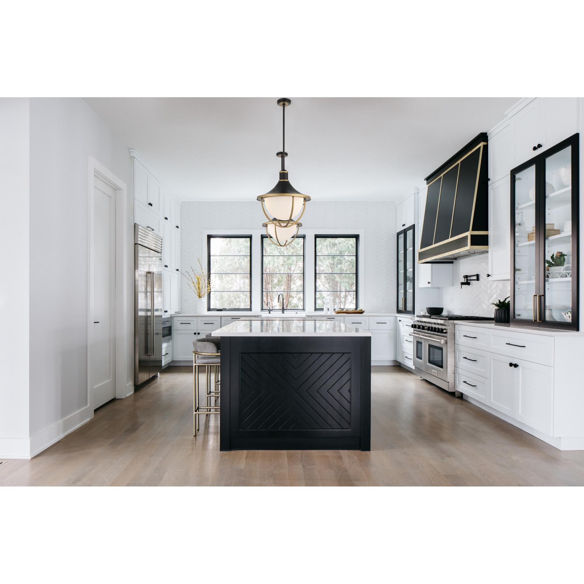 Shown in Matte Black + Textured Gold finish and White glass