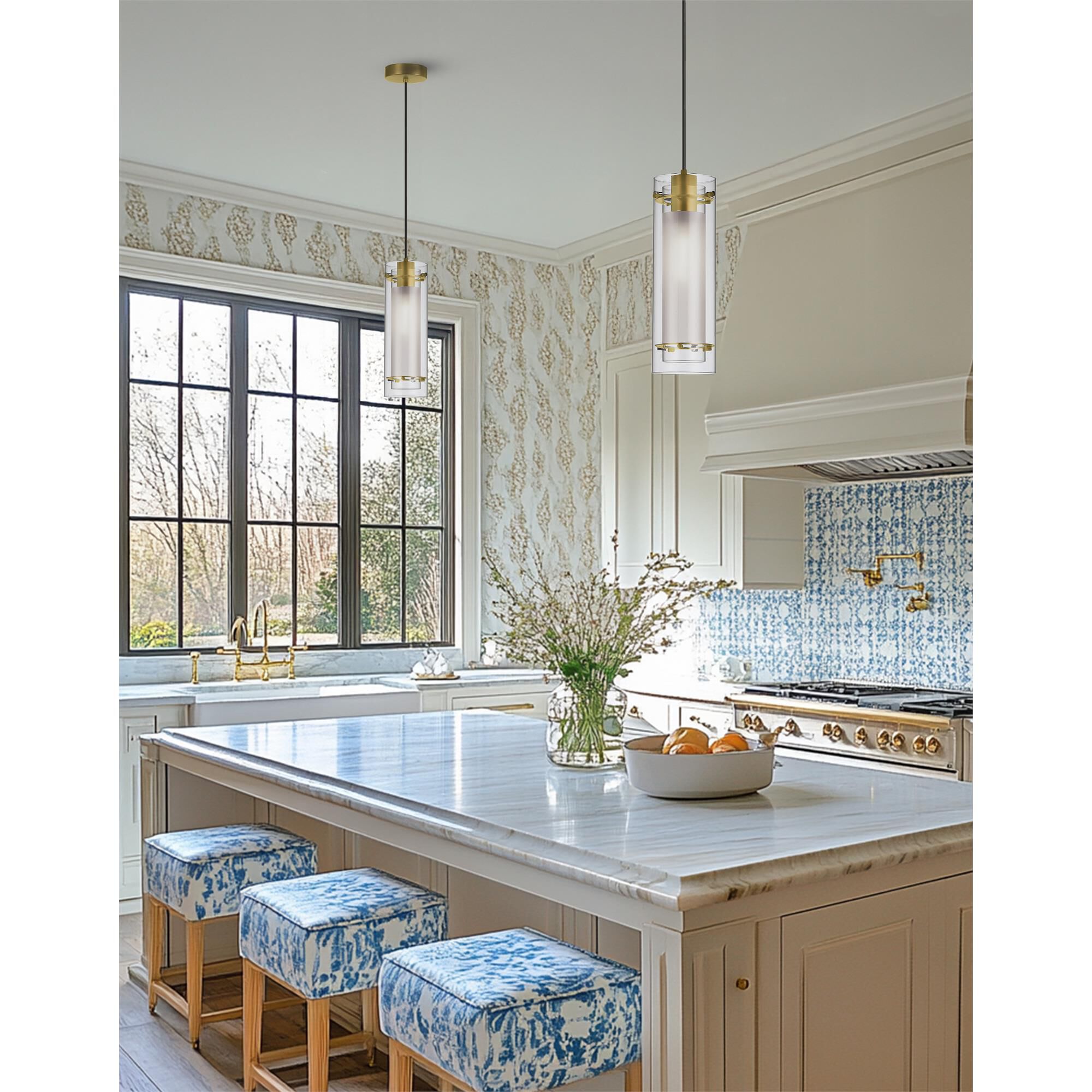 Shown in Aged Brass finish and Clear Cylinder glass