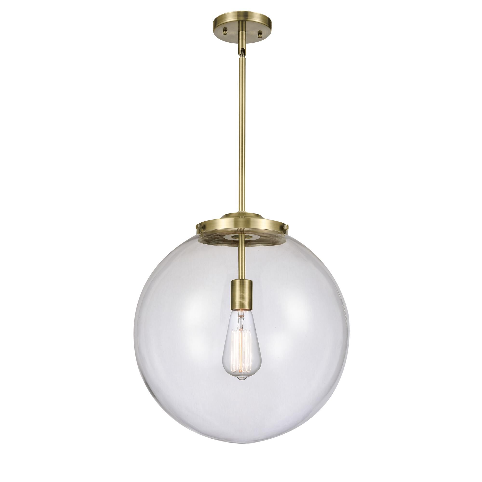 Shown in Antique Brass finish and Clear Beacon glass