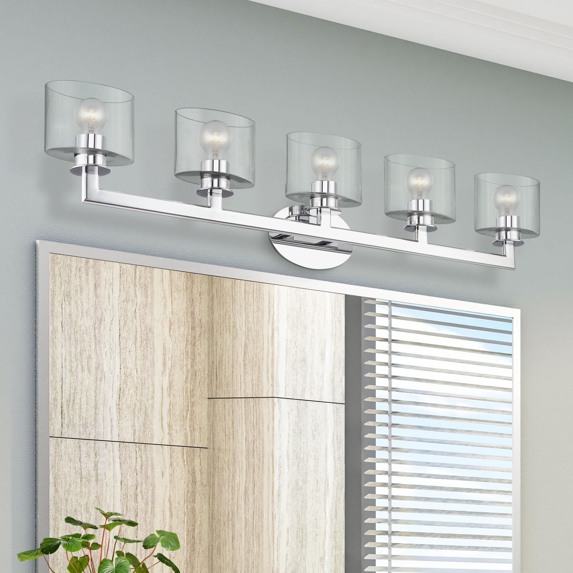 Shown in Polished Chrome finish and Mouth Blown Clear glass