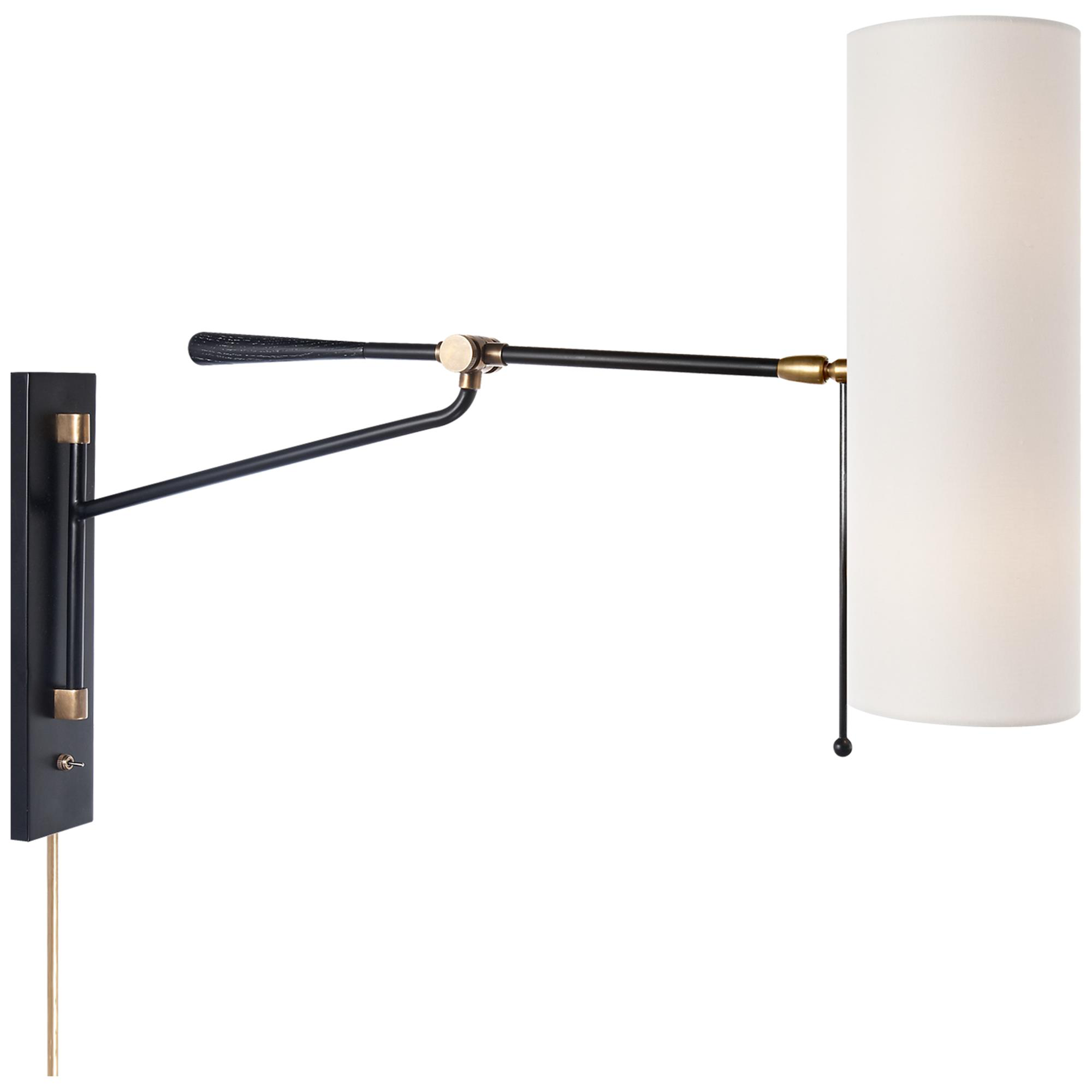 Shown in Black And Brass finish and Linen shade