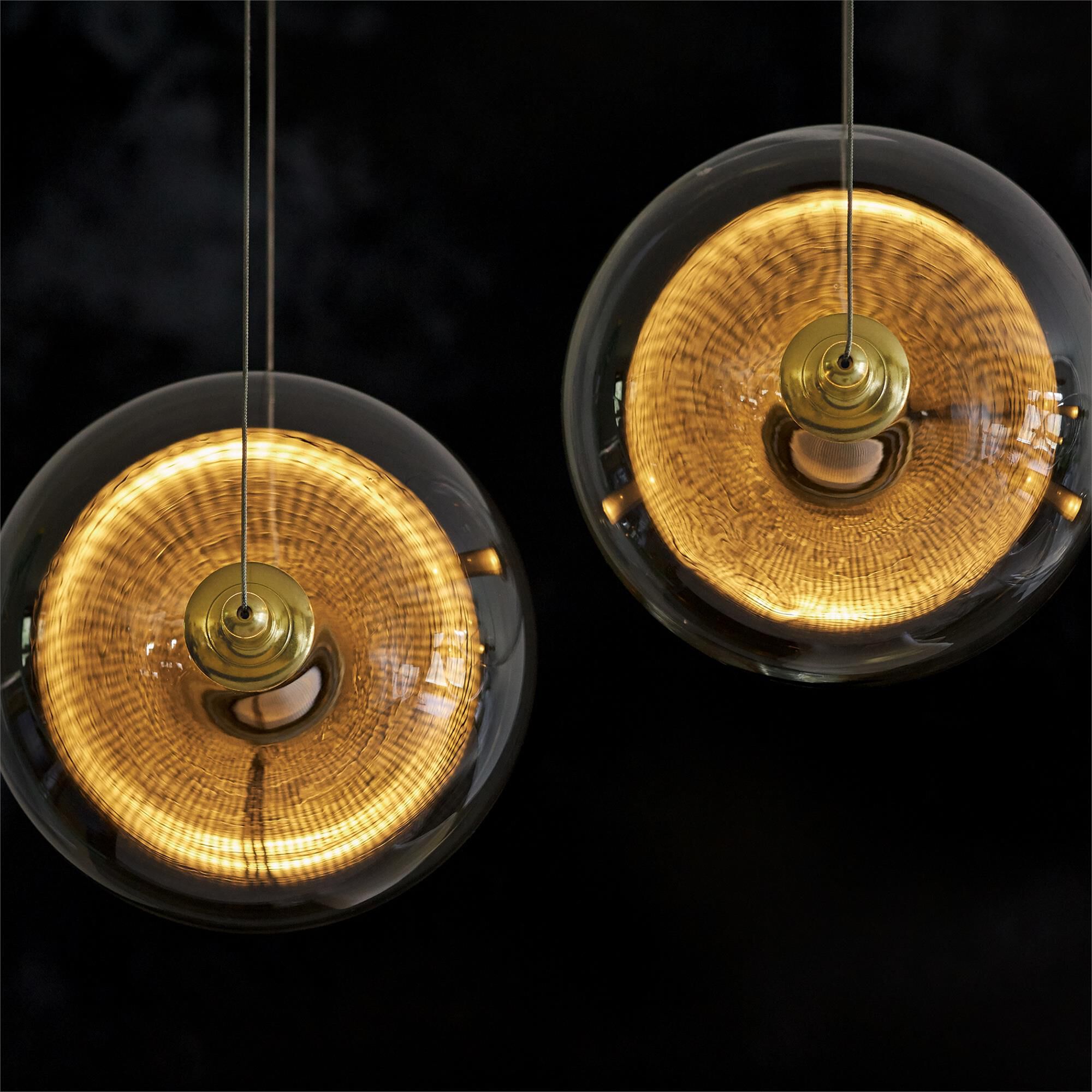 Shown in Brass with Black finish and Clear with frost glass