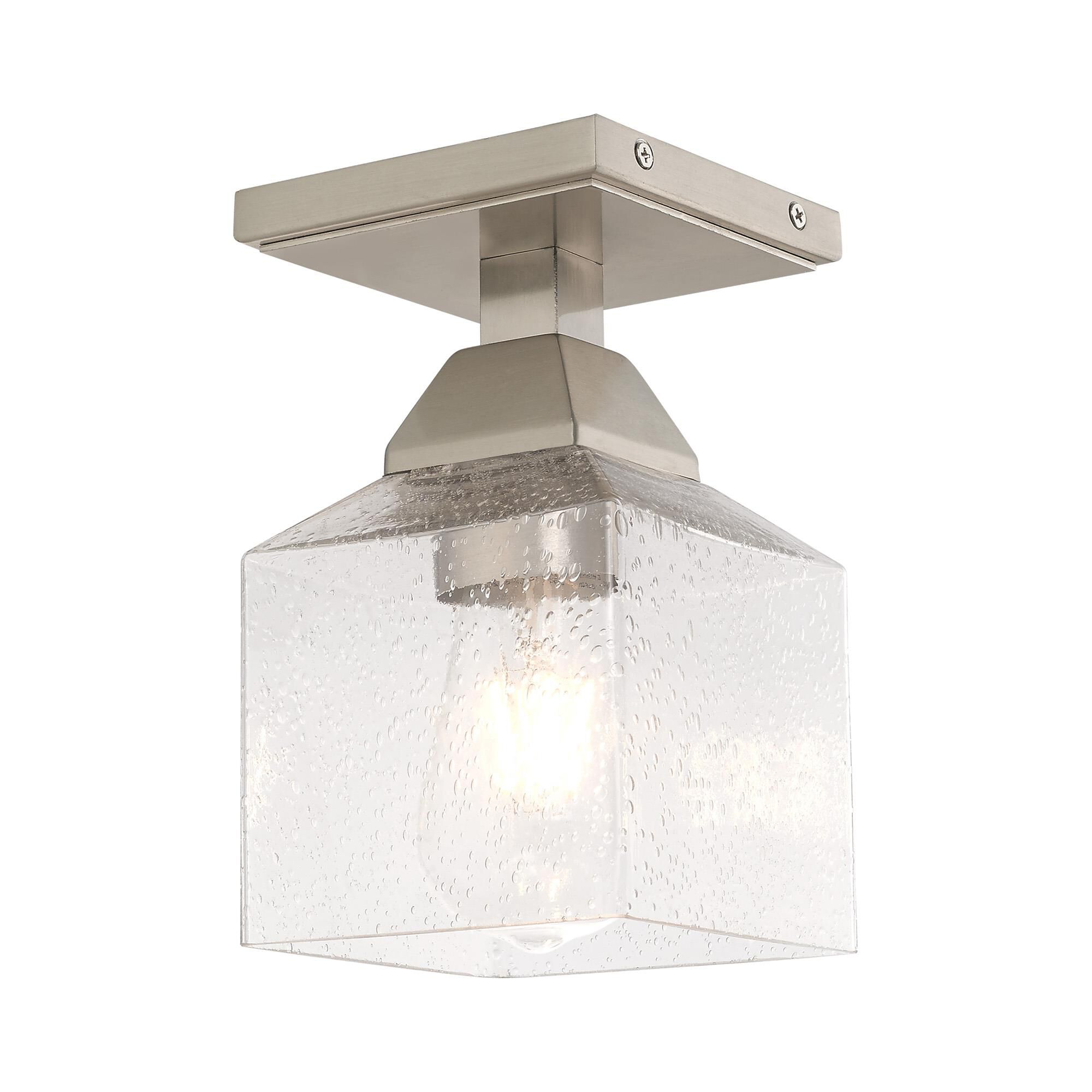 Shown in Brushed Nickel finish and Hand Blown Clear Seeded glass