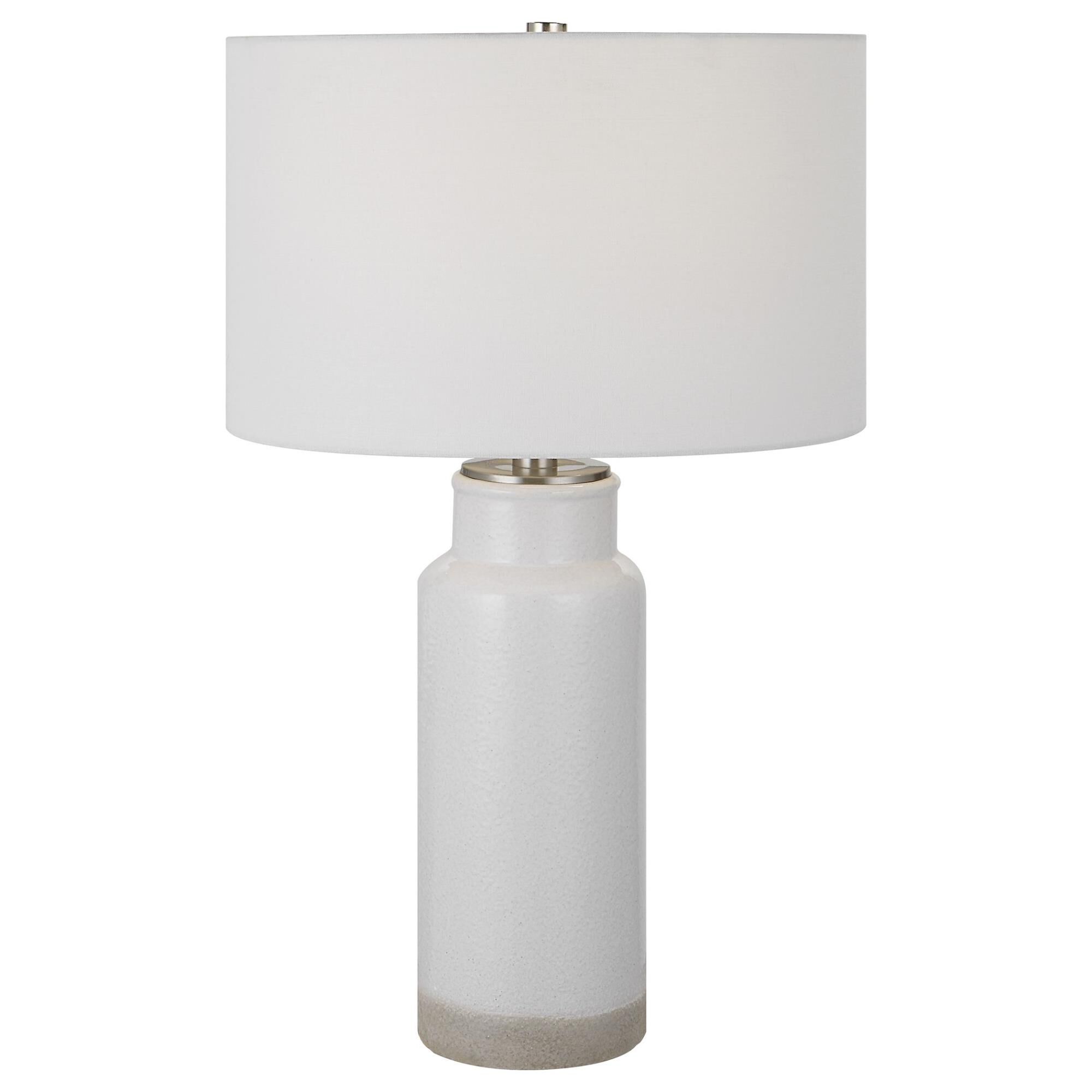 Shown in Inspired By Farmhouse Style Pottery, This Table Lamp Is Handcrafted From Ceramic Finished In A Textu finish and Round Hardback Drum shade