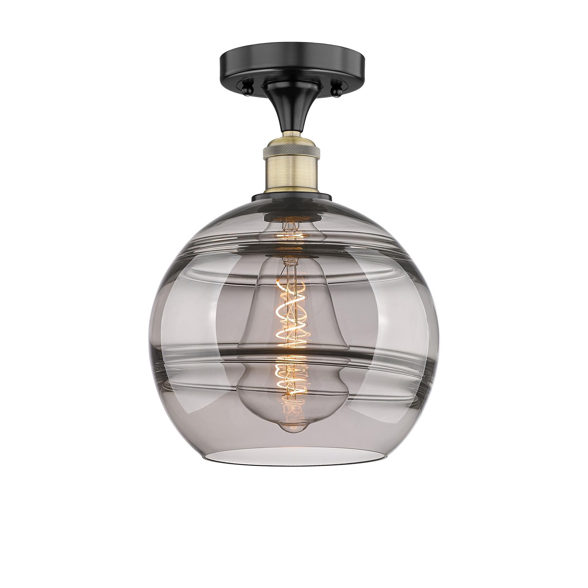 Shown in Black Antique Brass finish and Light Smoke glass