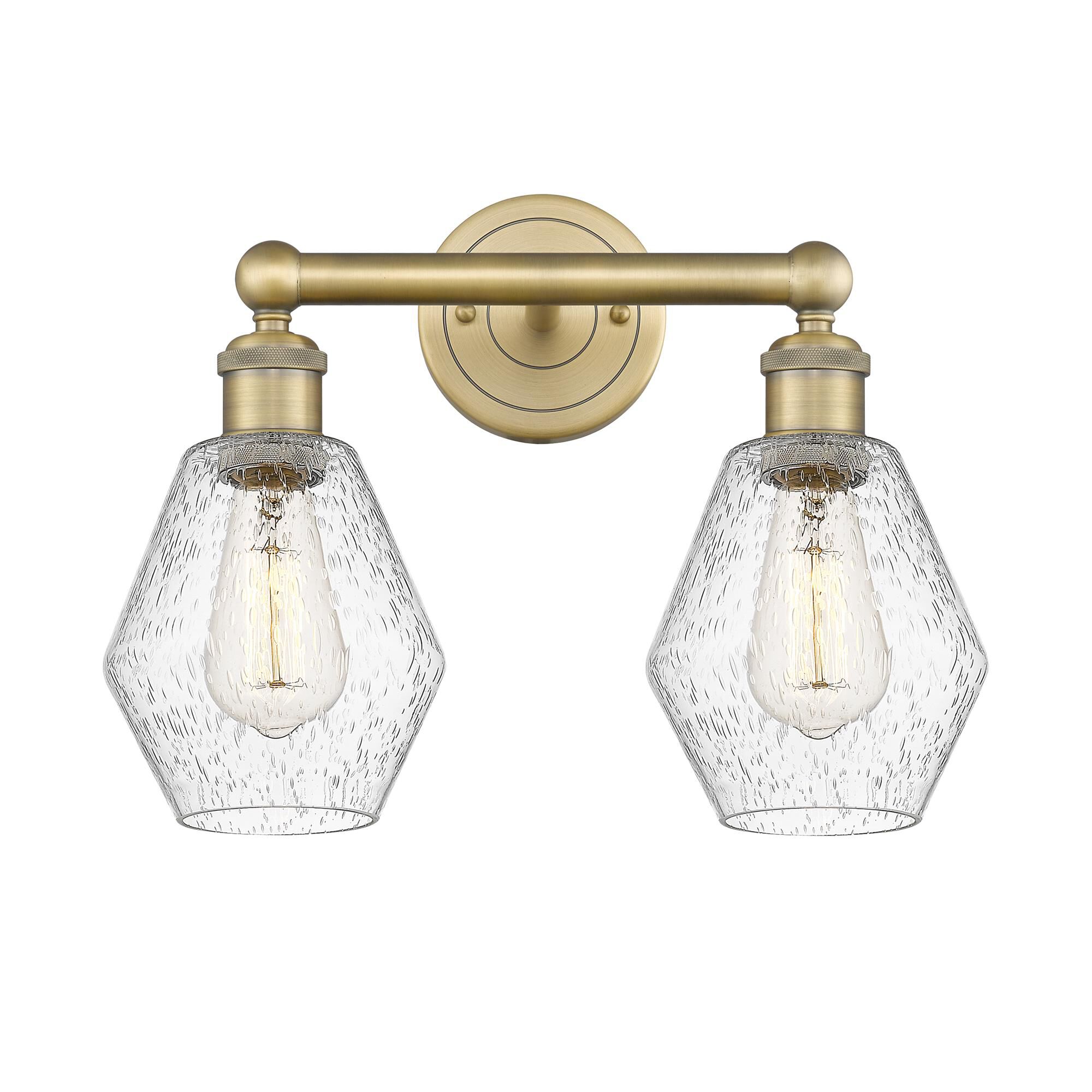 Shown in Brushed Brass finish and Seedy glass