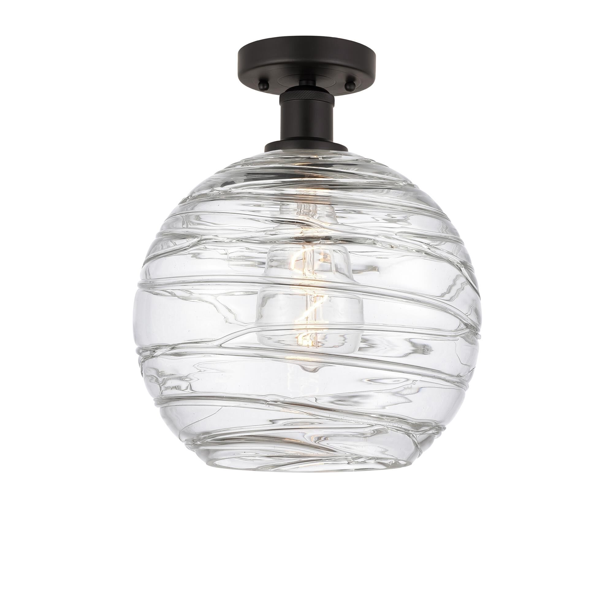 Shown in Oil Rubbed Bronze finish and Clear Deco Swirl glass
