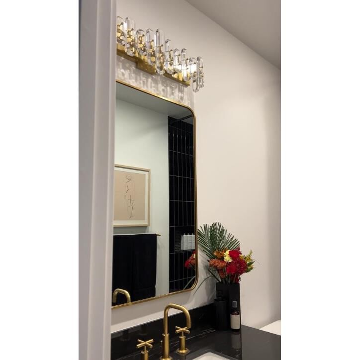 Shown in Aged Brass finish and Faceted Crystal Elements crystal