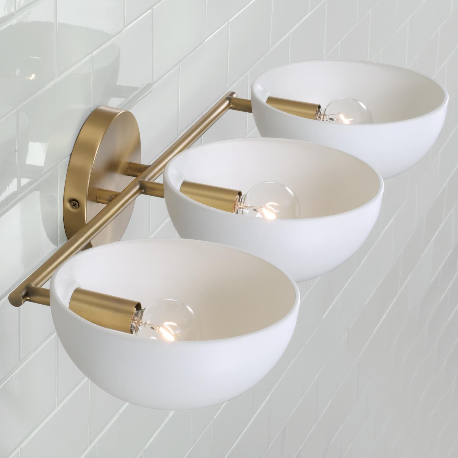Shown in Aged Brass And White finish and Matte White Metal s shade