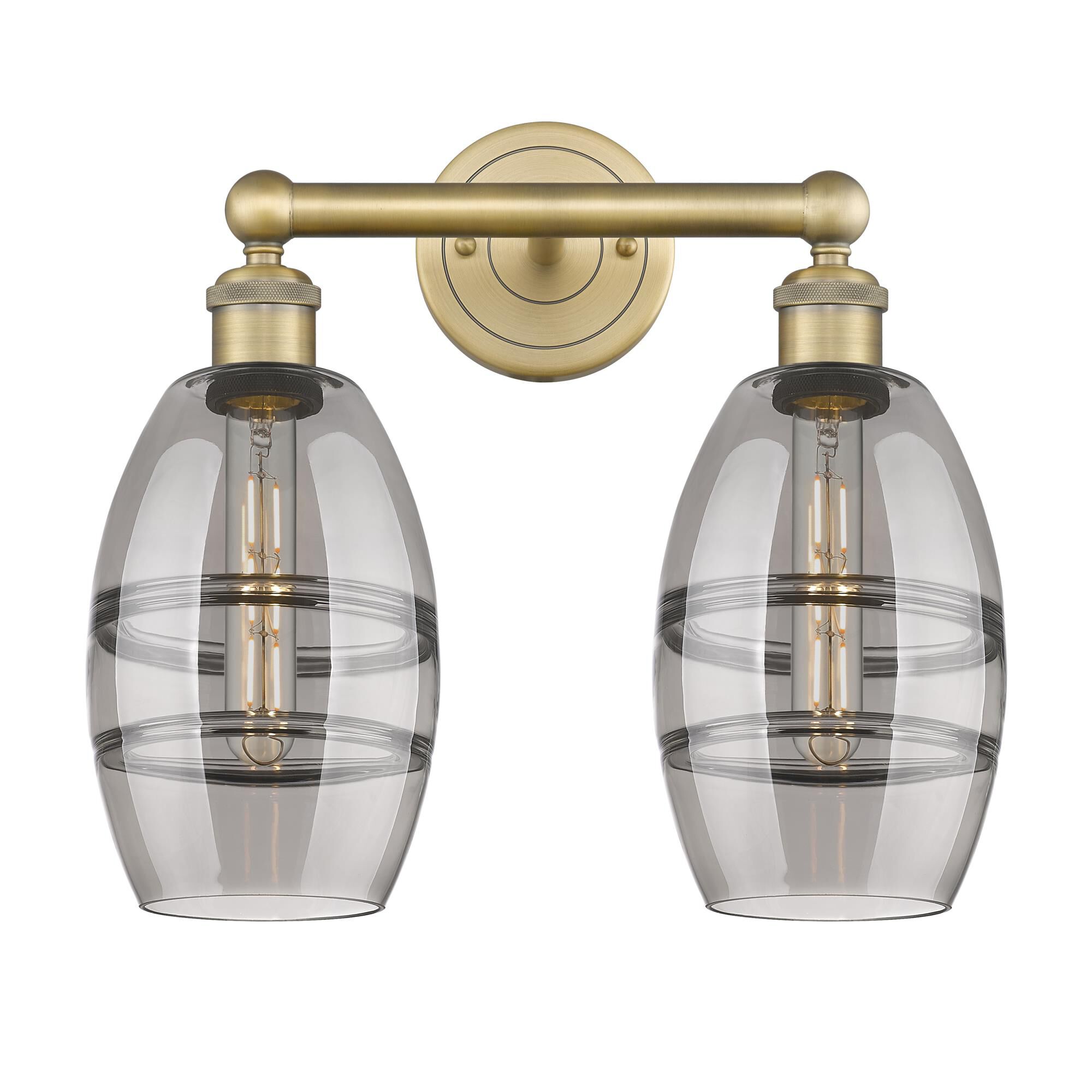 Shown in Brushed Brass finish and Light Smoke glass