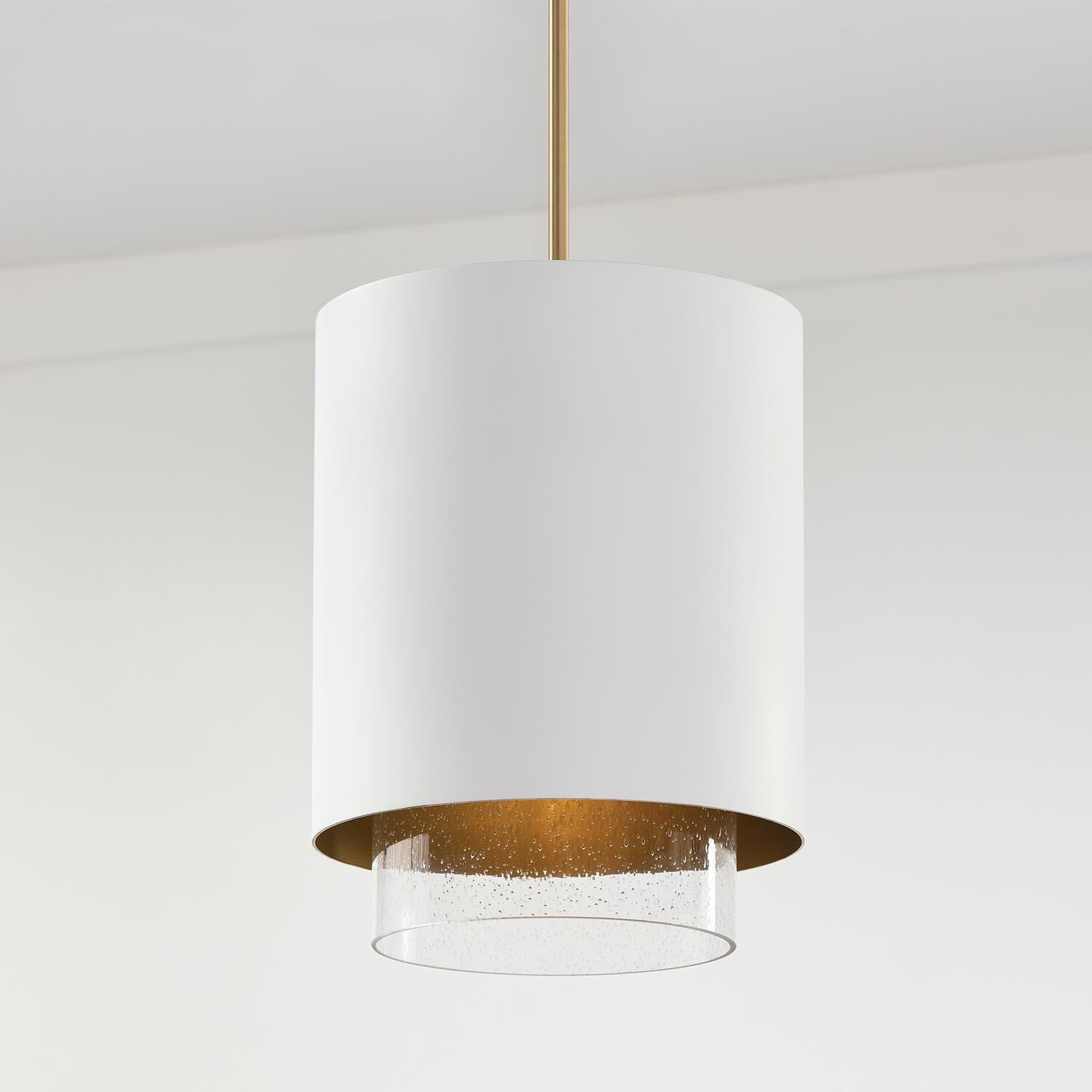 Shown in Matte Brass and White finish and Clear Seeded glass and Metal with Brass Interior shade