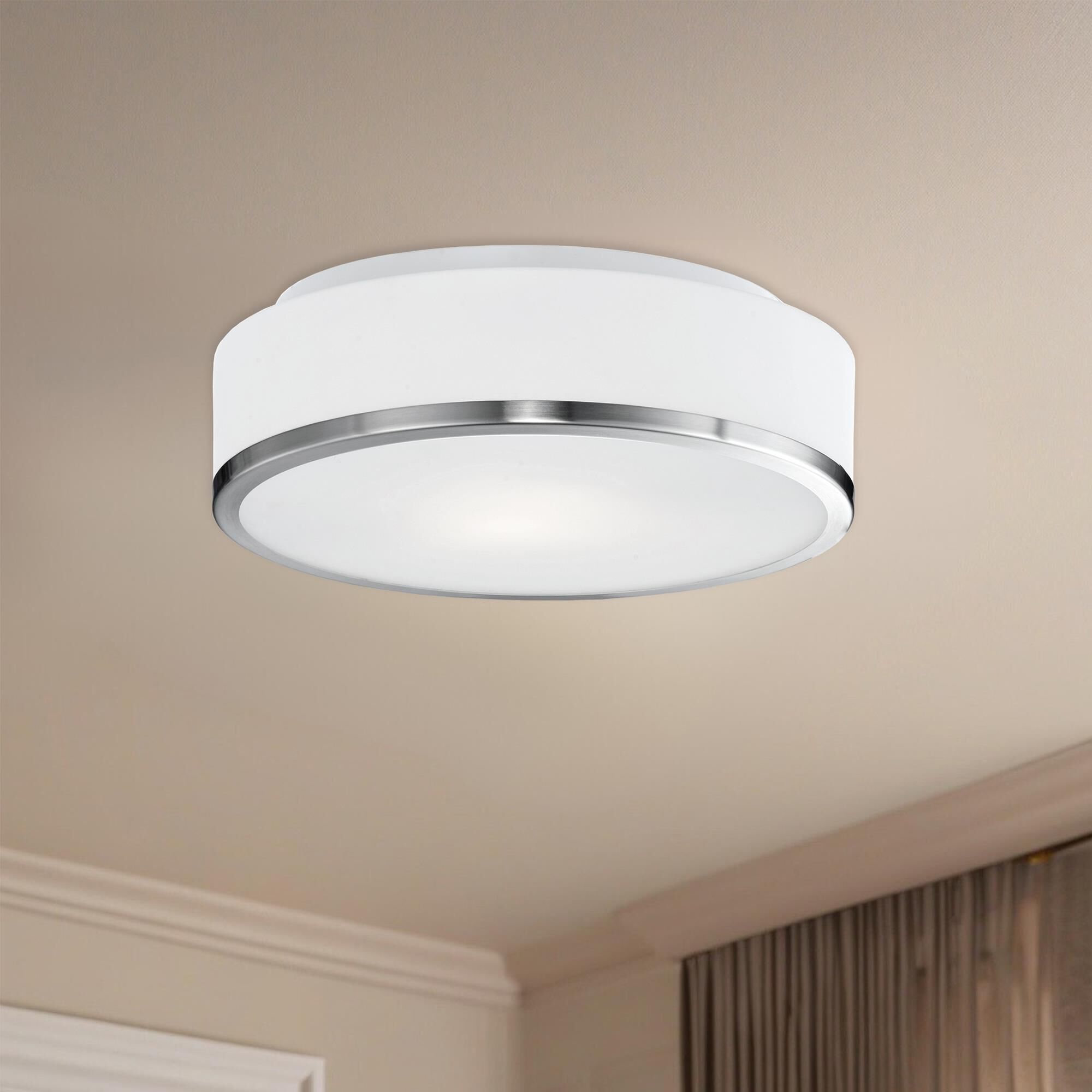 Shown in Brushed Nickel finish and White Opal glass