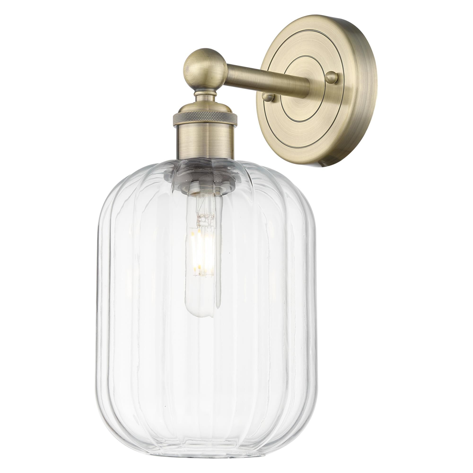 Shown in Antique Brass finish and Clear glass