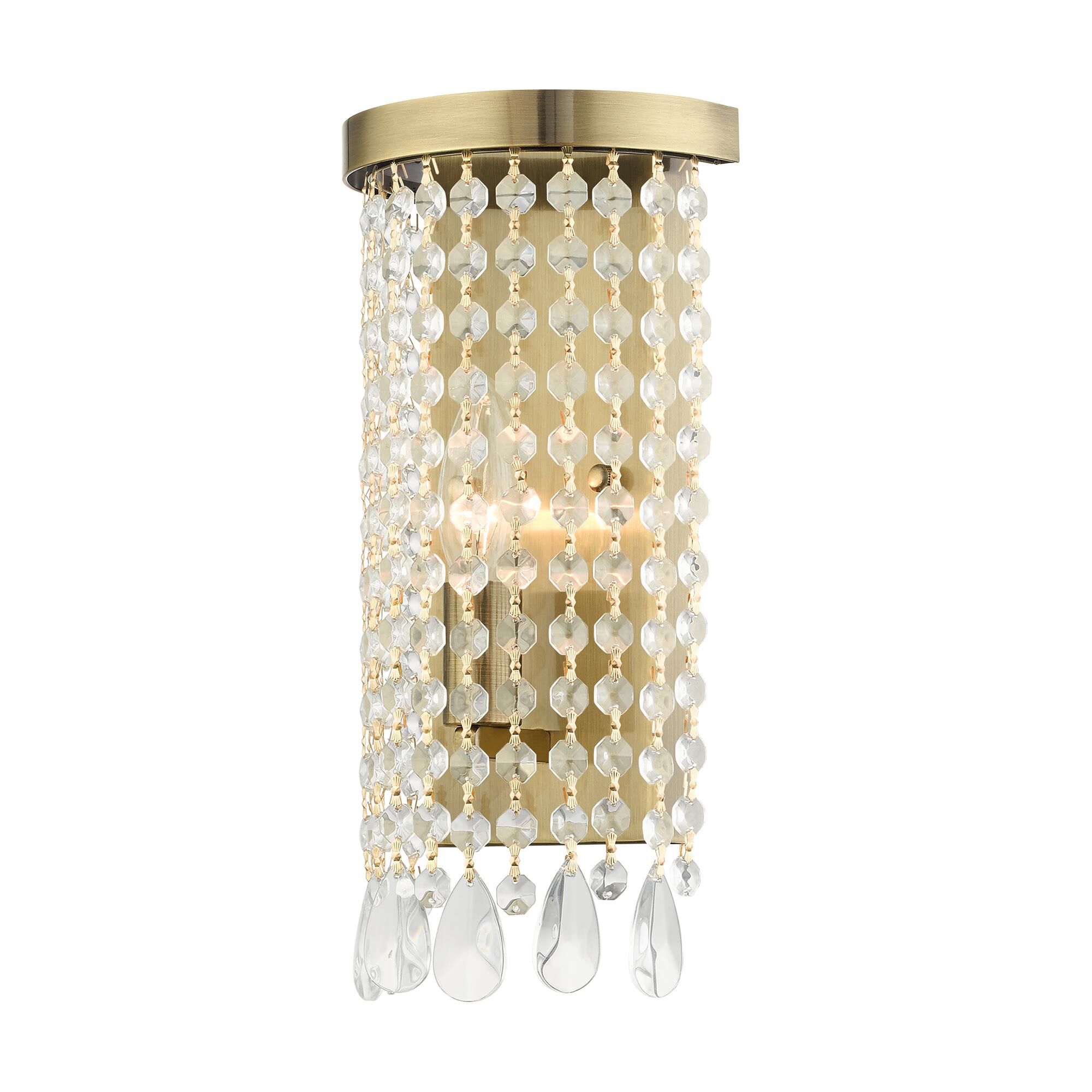 Shown in Antique Brass finish and Hand Assembled Crystal Shade glass