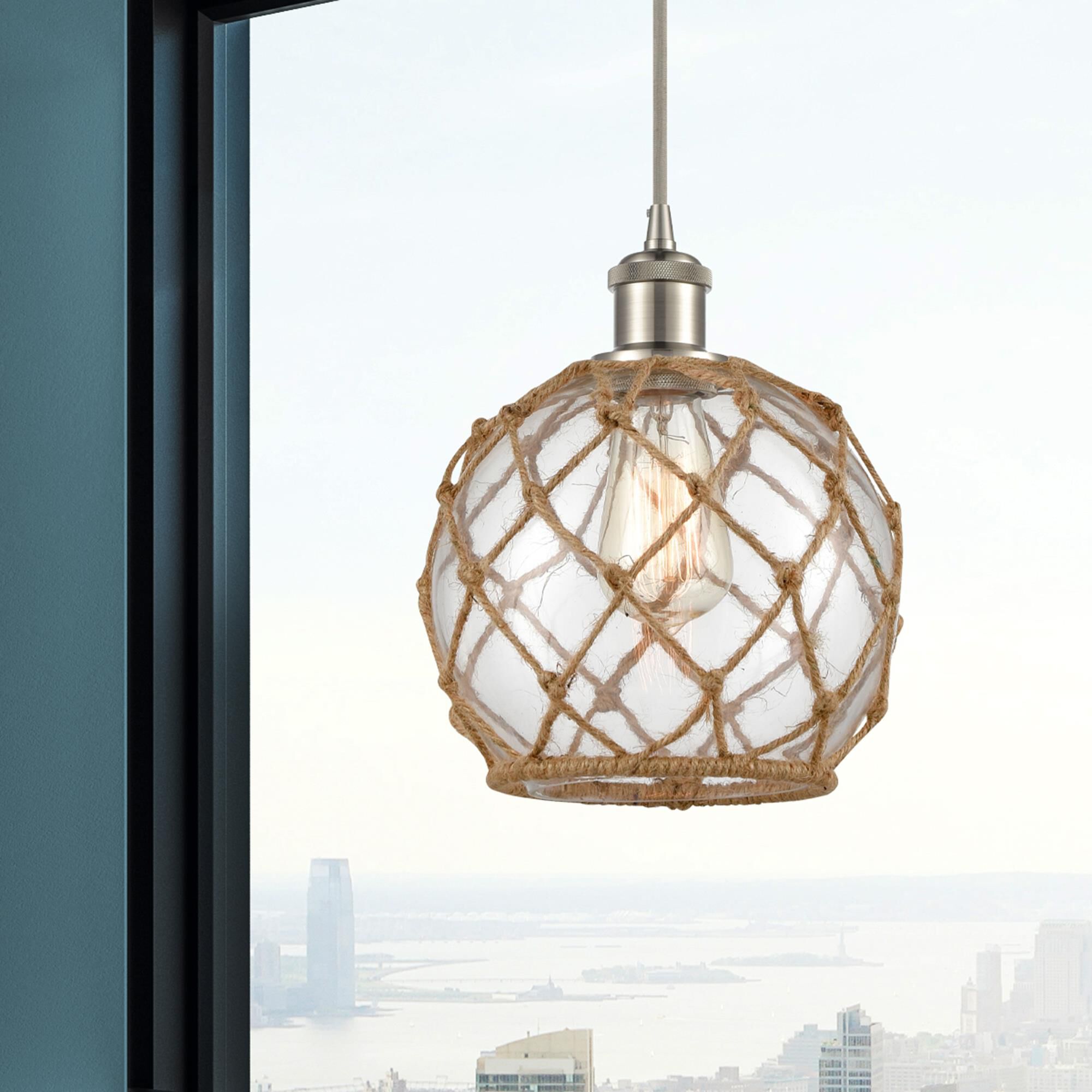 Shown in Brushed Satin Nickel finish and Clear With Black Rope glass