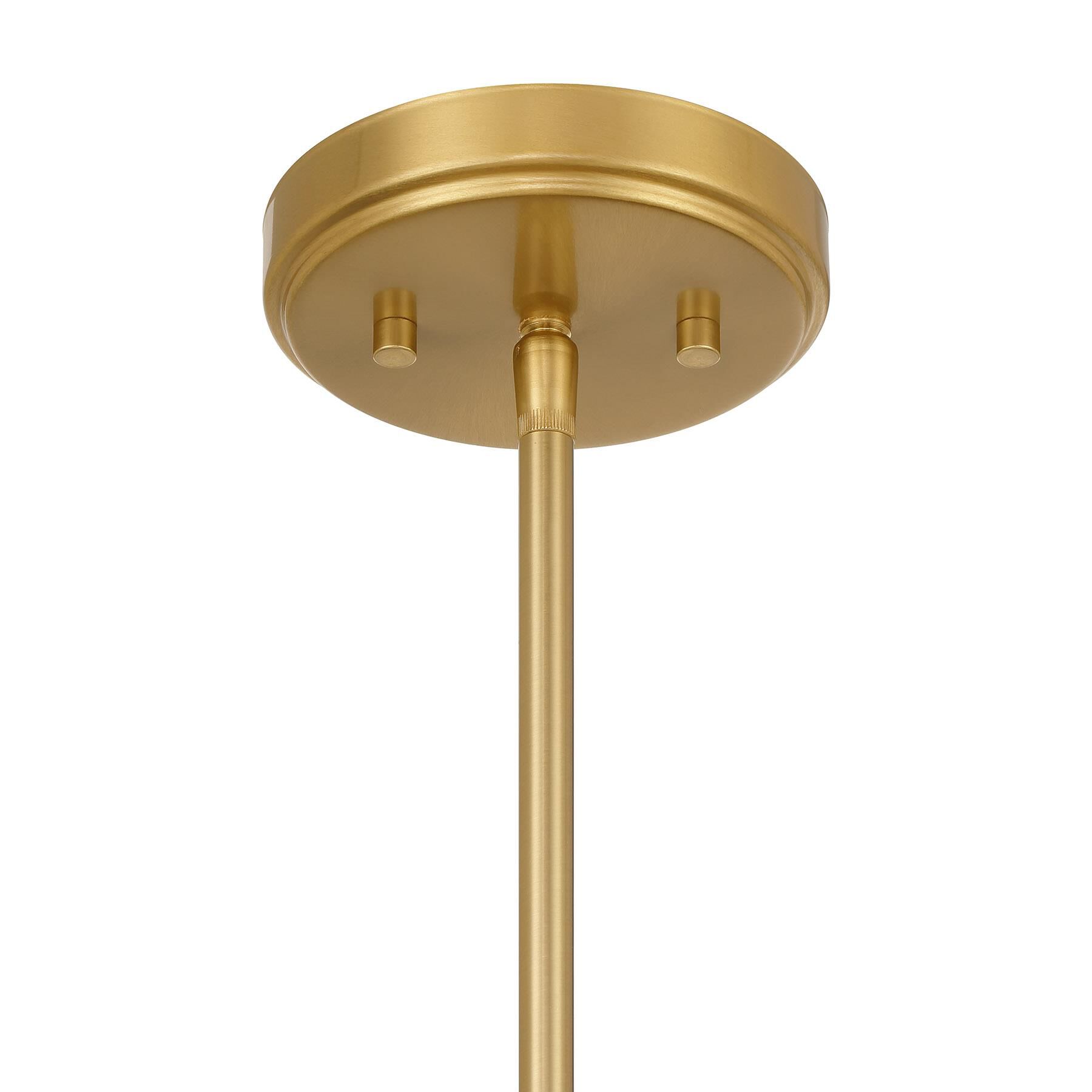 Shown in Warm Brass finish and White Ribbed glass