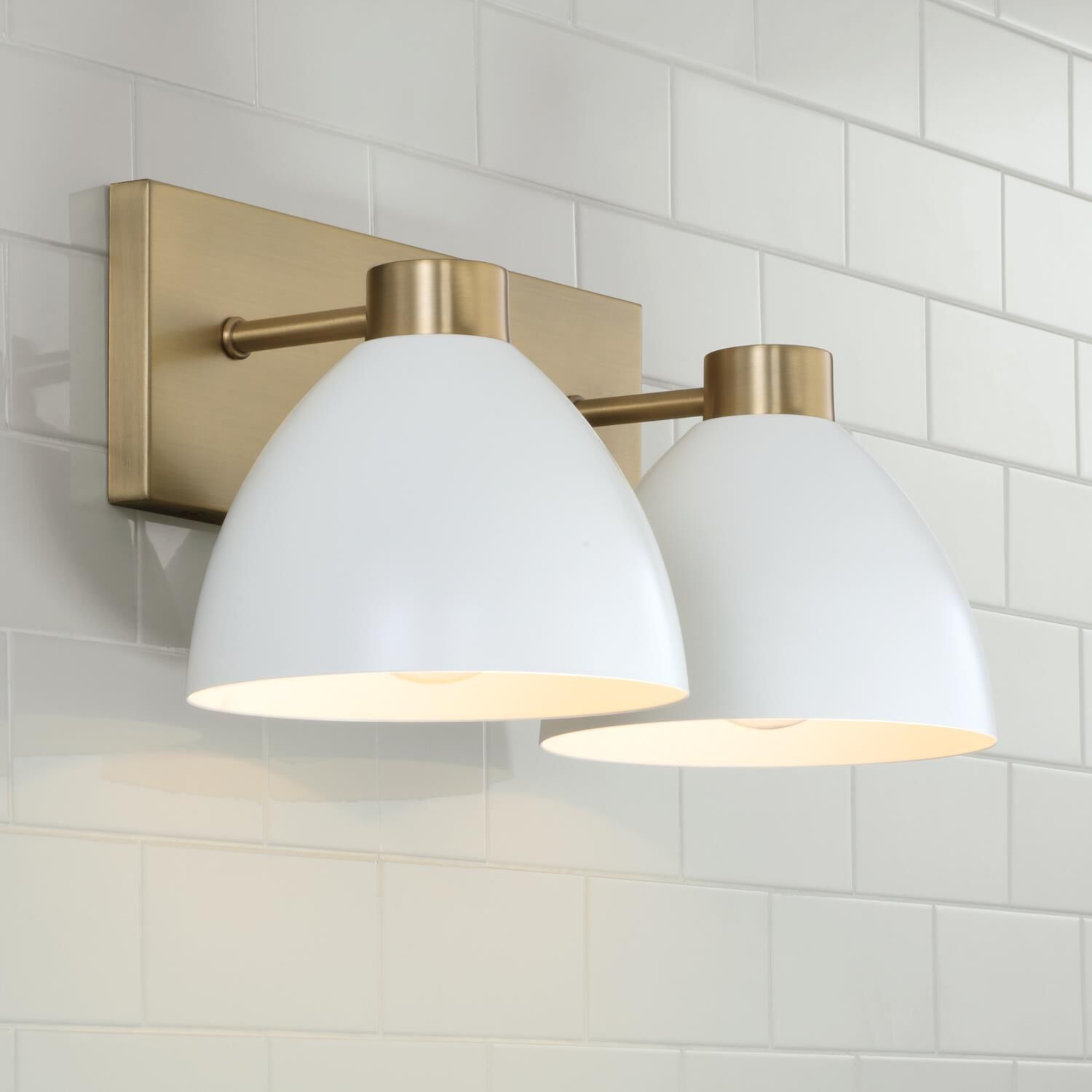 Shown in Aged Brass And White finish and Matte White Metal shade