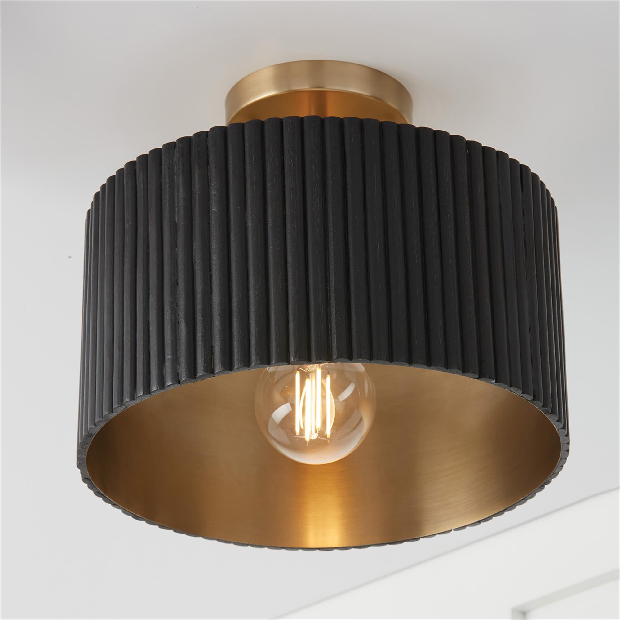 Shown in Black Stain And Matte Brass finish