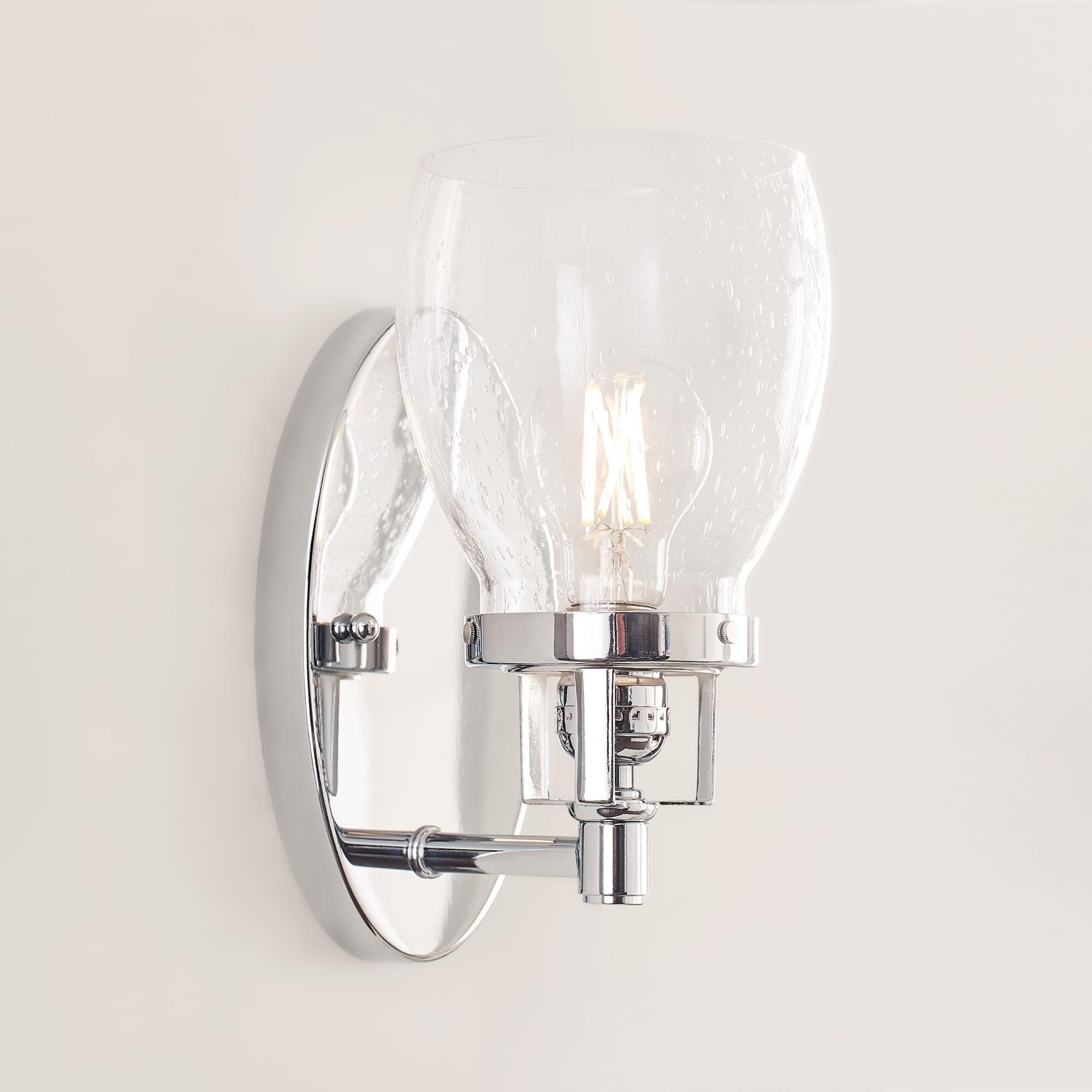 Shown in Chrome finish and Clear Seeded glass