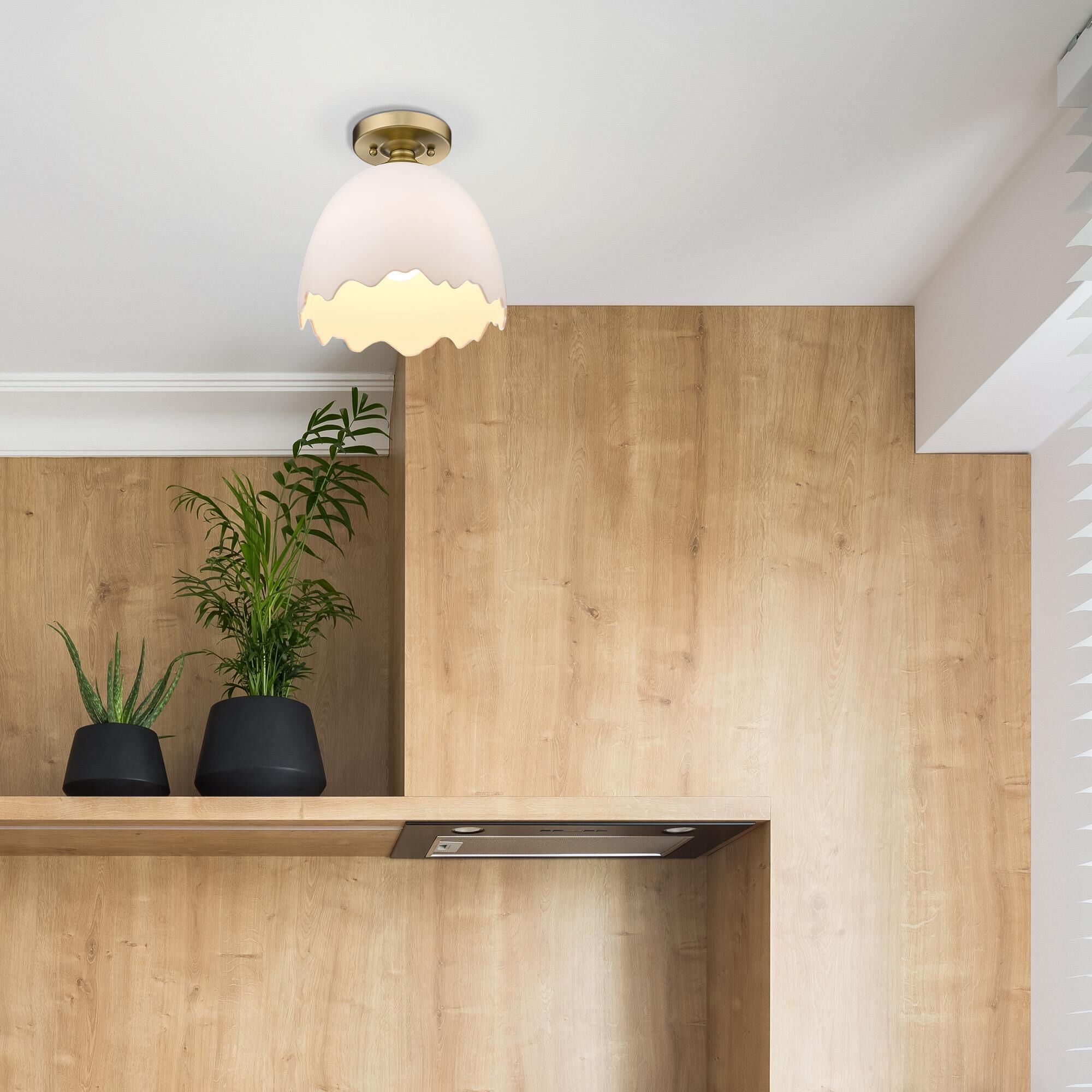 Shown in Brushed Champagne Bronze finish and Porcelain Shade glass