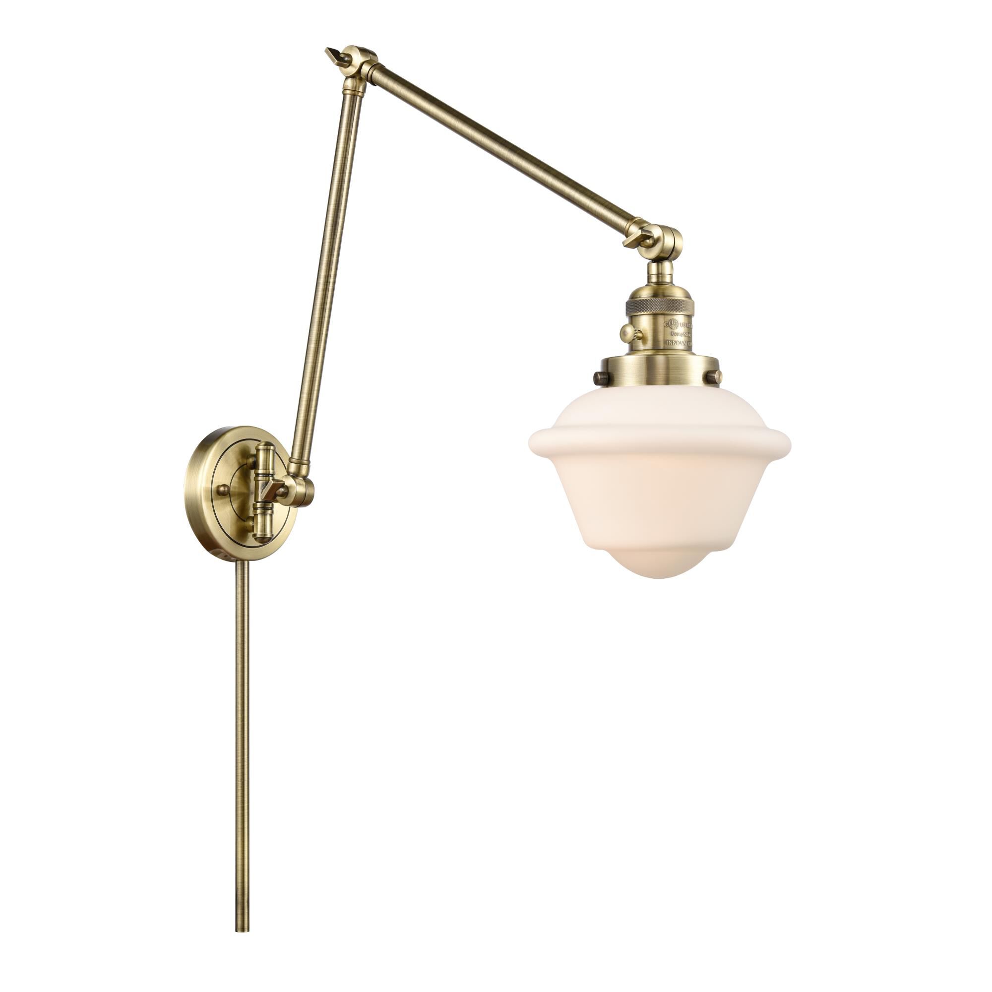 Shown in Antique Brass finish and Matte White Cased Small Oxford glass