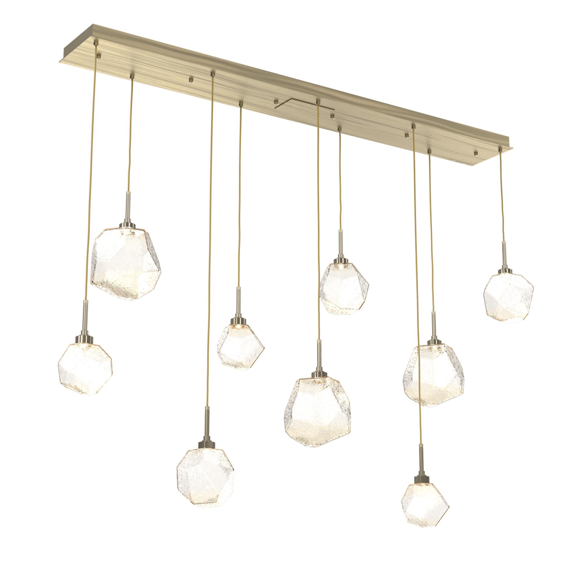 Shown in Novel Brass finish and Amber glass