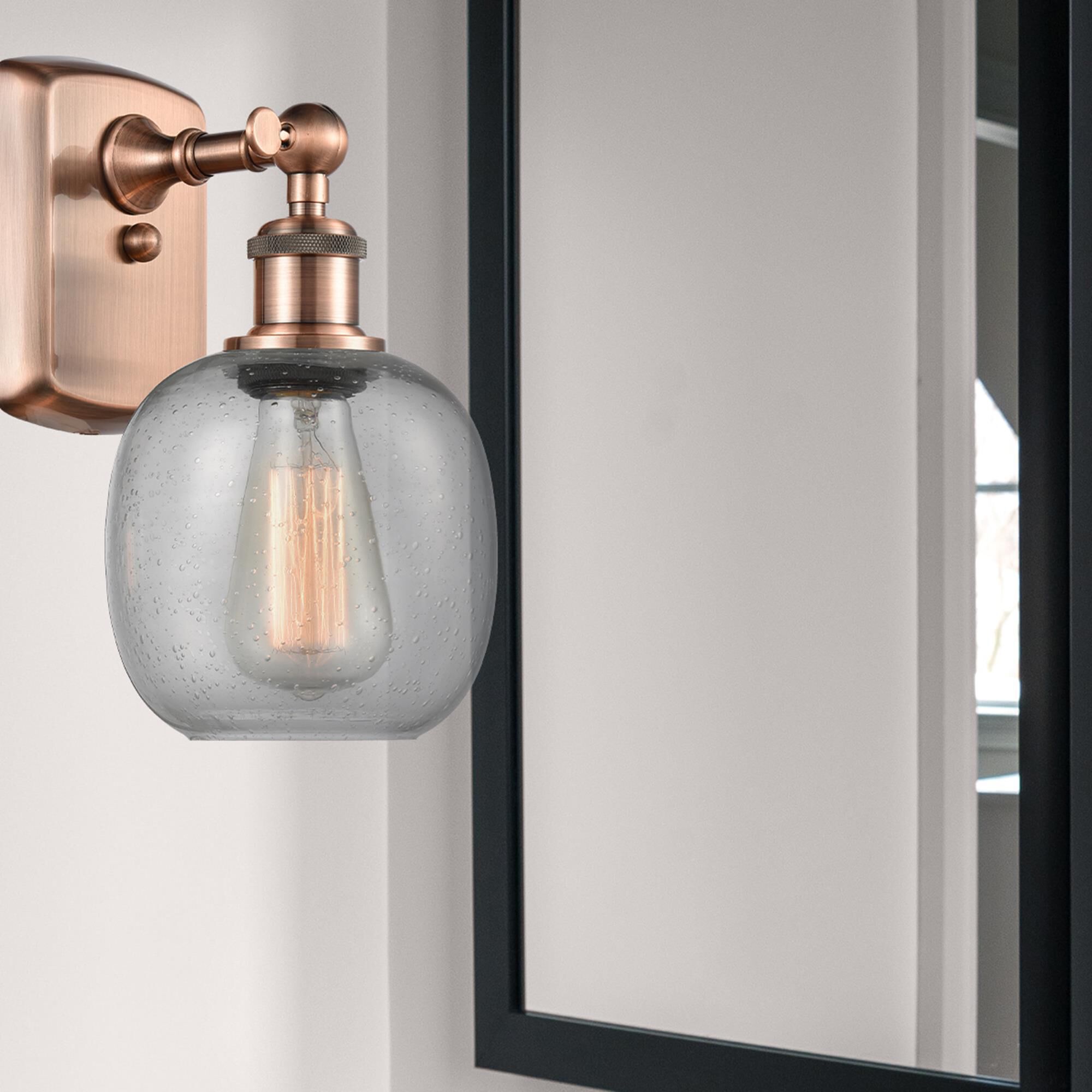 Shown in Antique Copper finish and Sphere glass and Glass shade