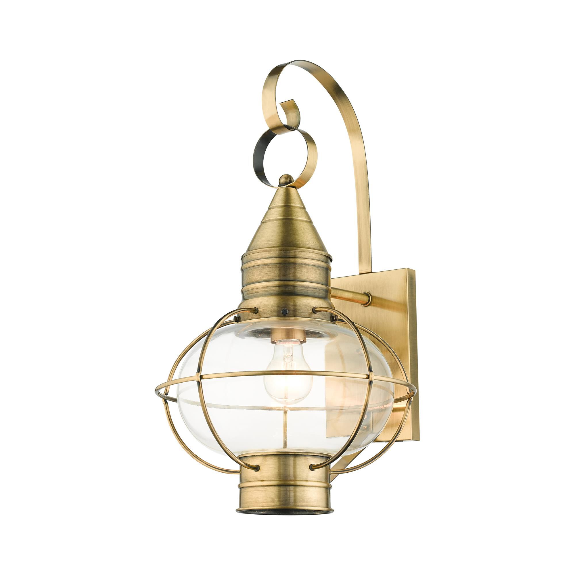 Shown in Antique Brass finish and Hand Blown Clear glass