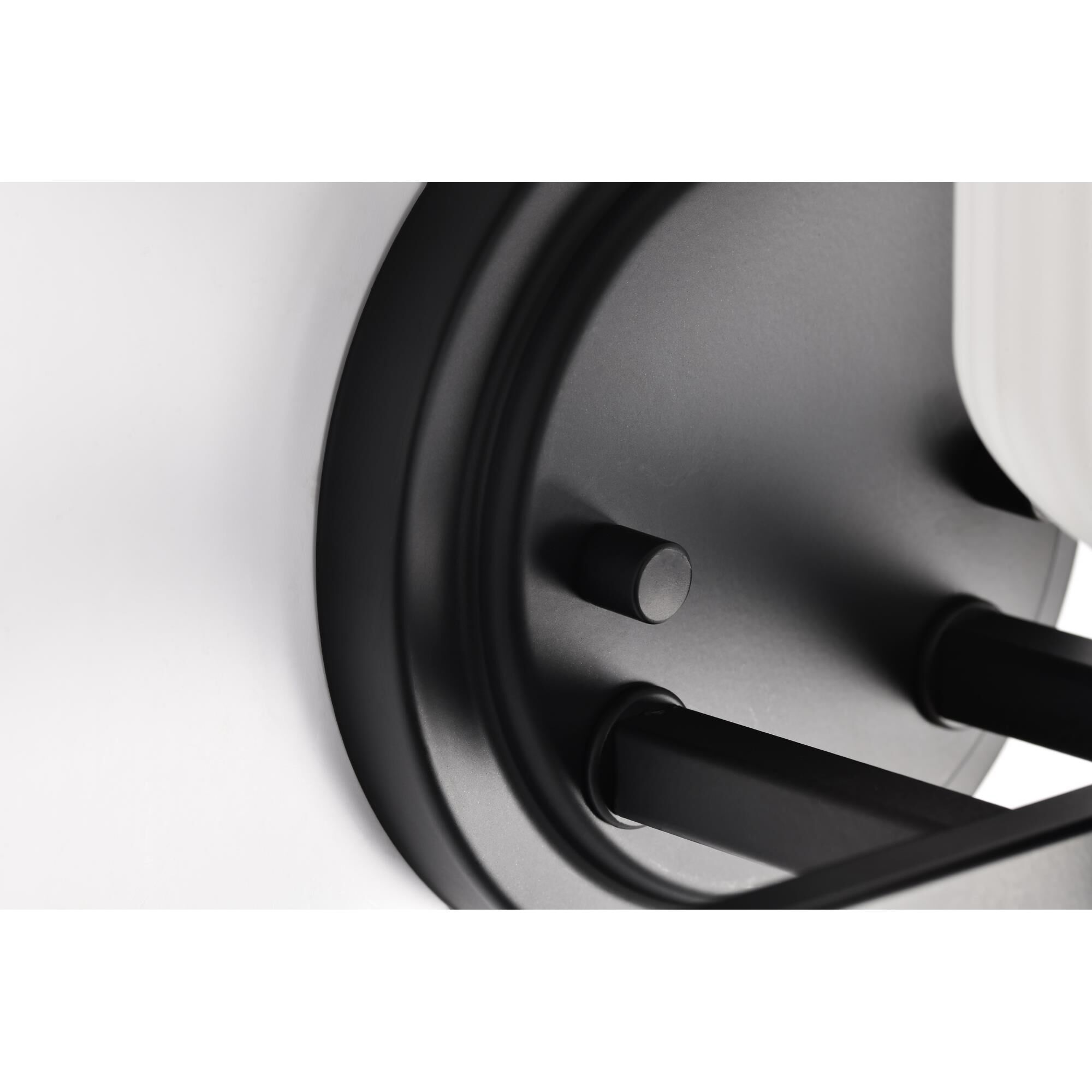 Shown in Matte Black finish and Frosted Ribbed glass