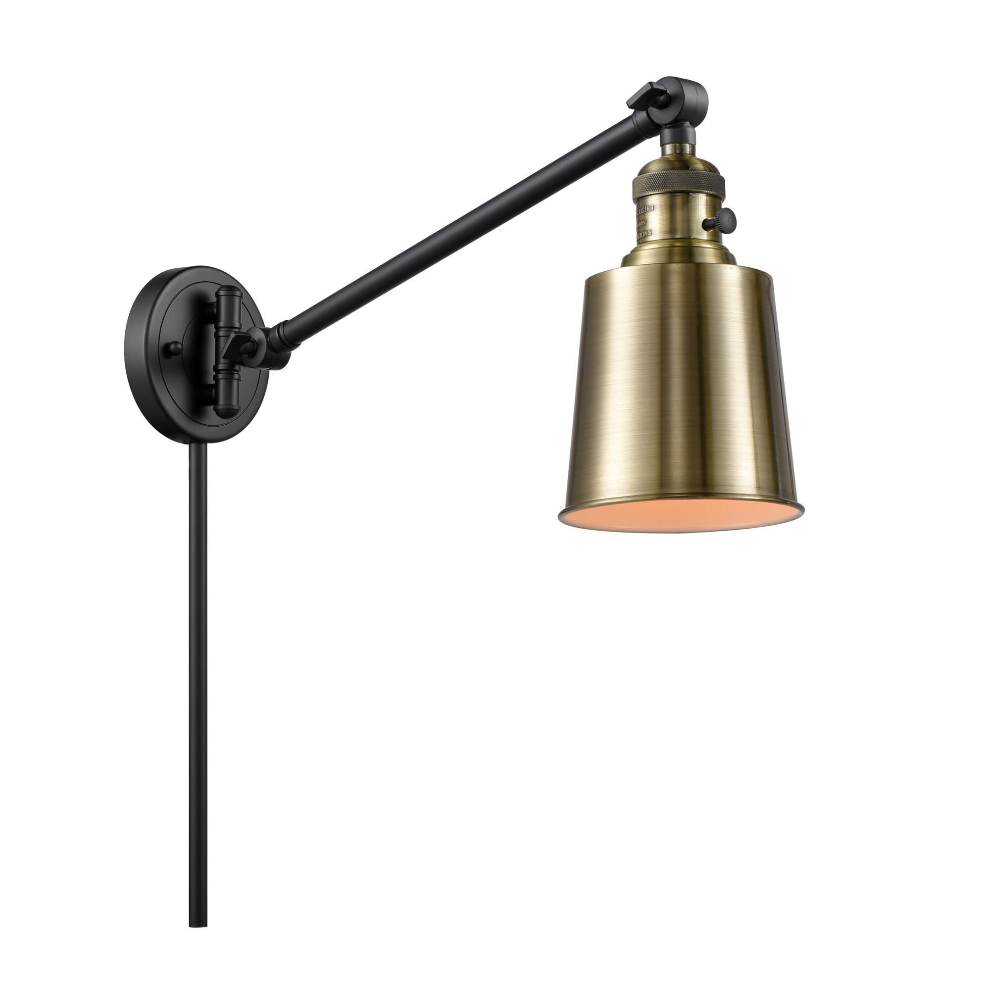 Shown in Black Antique Brass finish and Cone glass and Metal shade