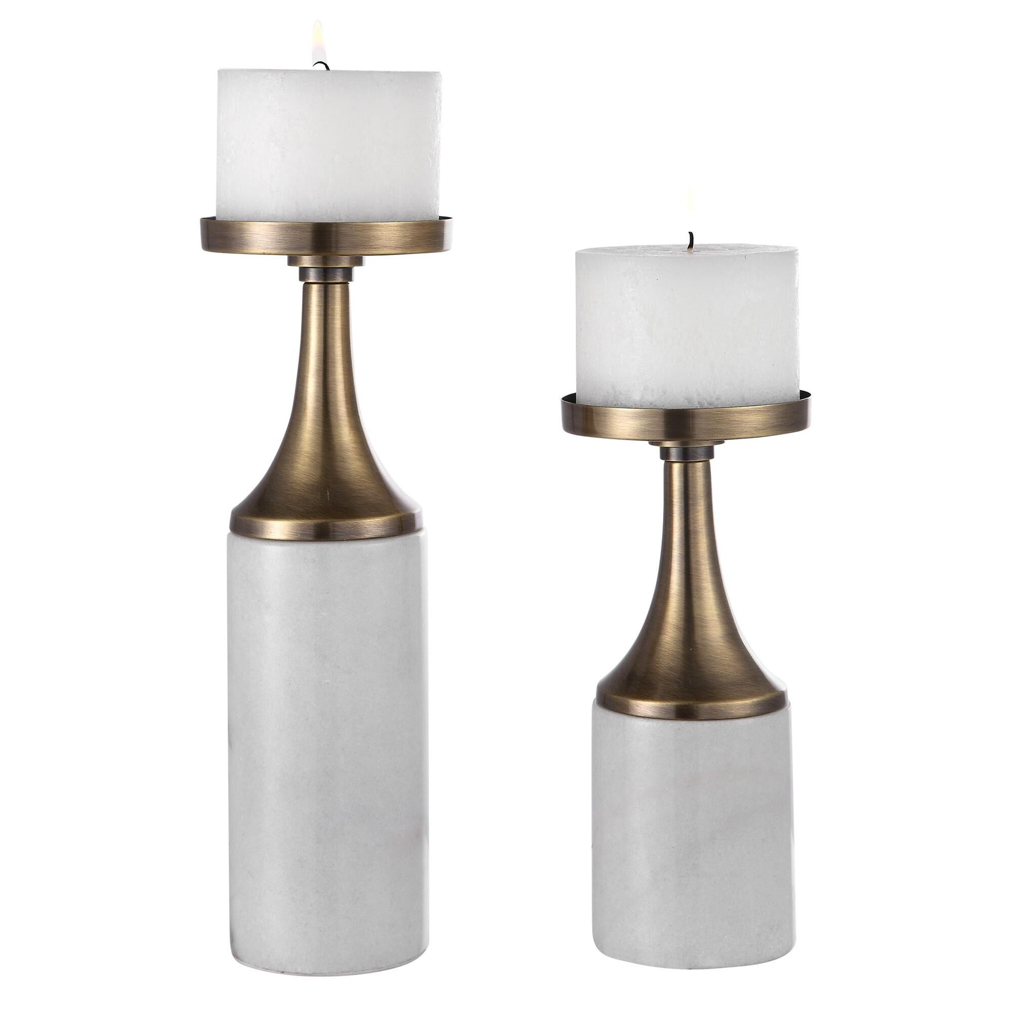 Shown in Set Of Two Candleholders Feature An Antique Brushed Brass Finish And An Elegant White Marble Foot. T finish