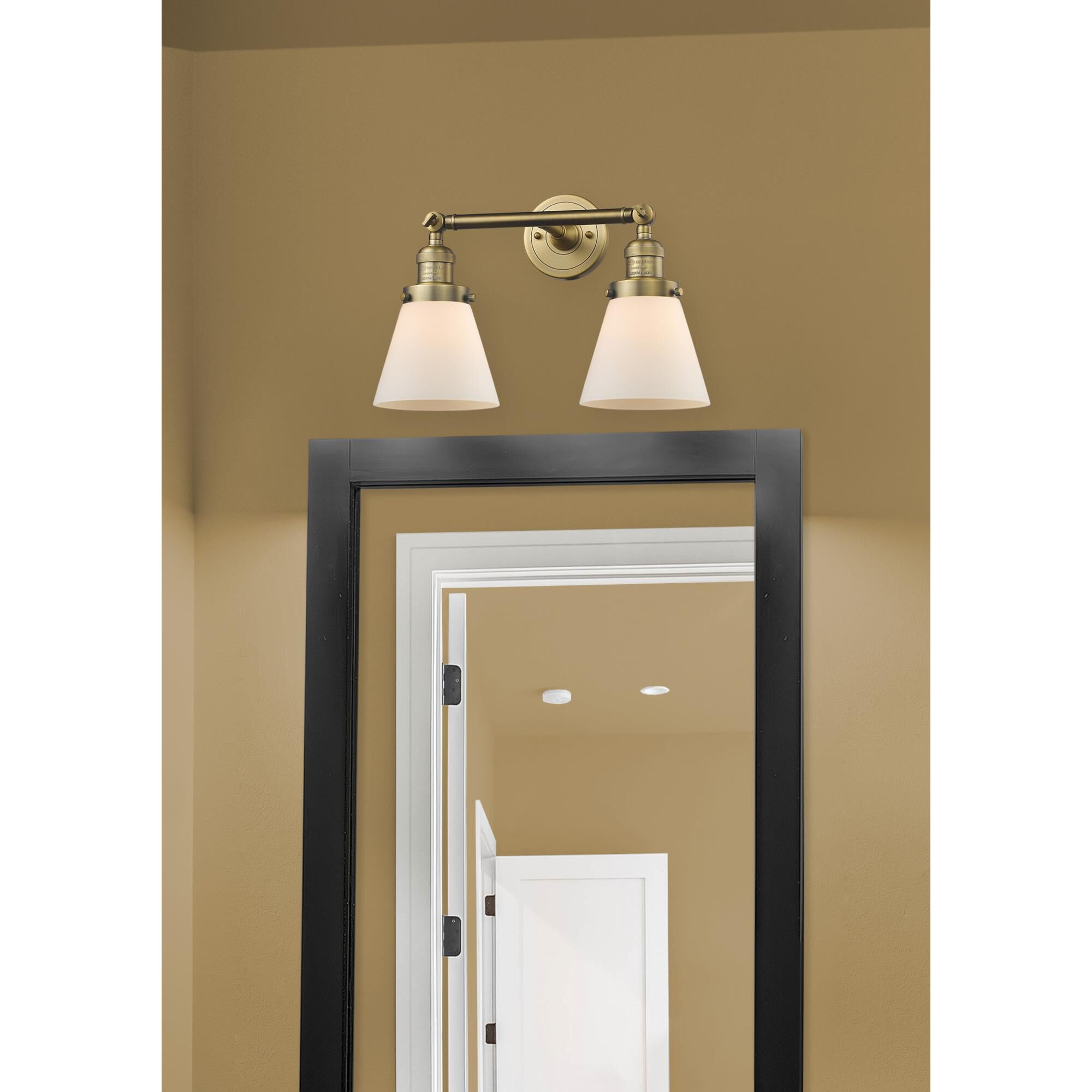 Shown in Brushed Brass finish and Matte White Cased glass