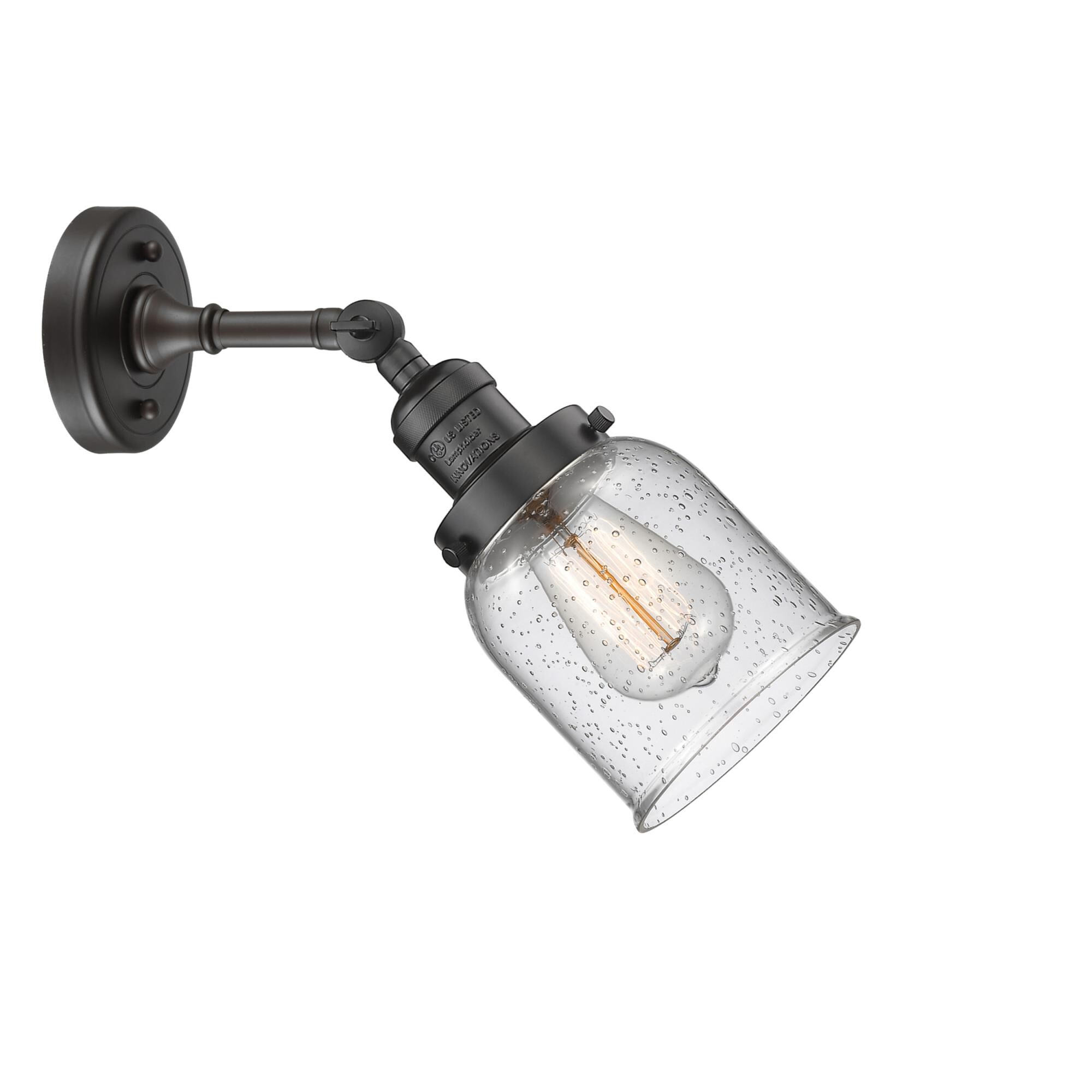 Shown in Oil Rubbed Bronze finish and Seedy glass and None accent