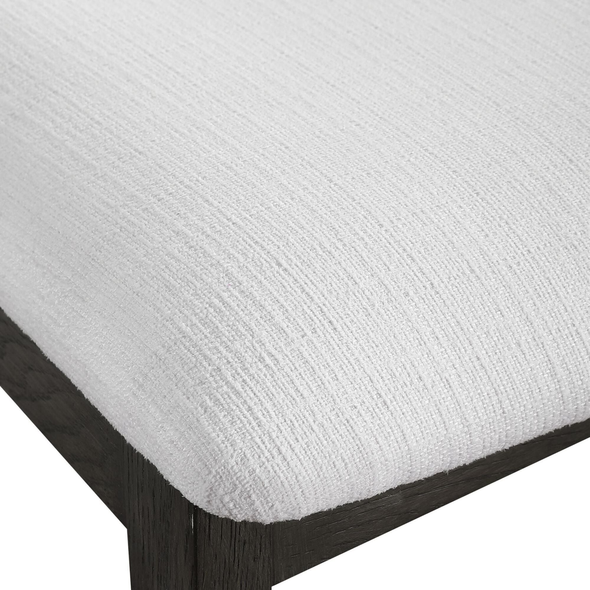 Shown in Gently Sloped Padded Seat In A Crisp White Polyester Blend Fabric Rests Within A Solid Oak Wood Fram finish