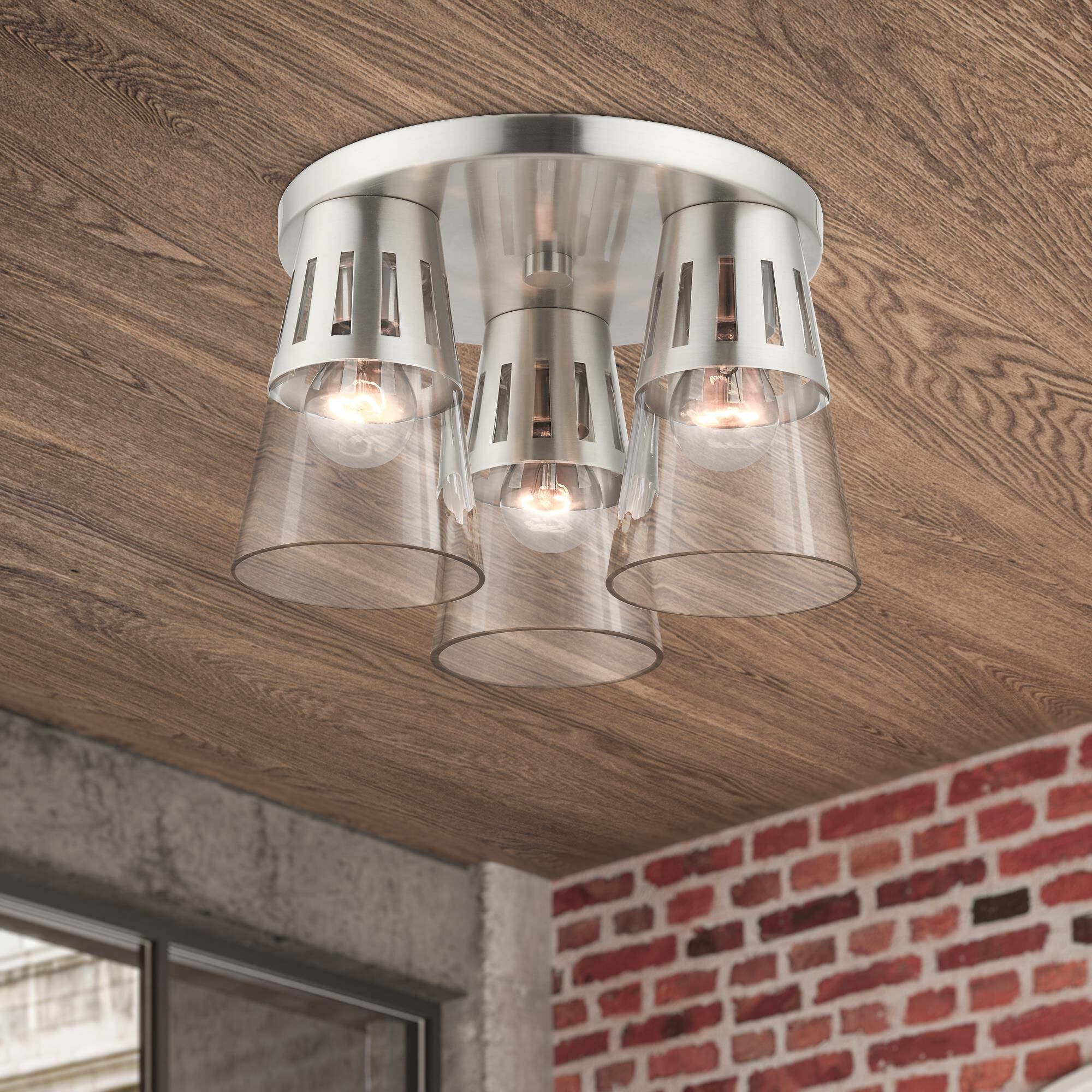 Shown in Brushed Nickel finish and Clear Hand Blown glass