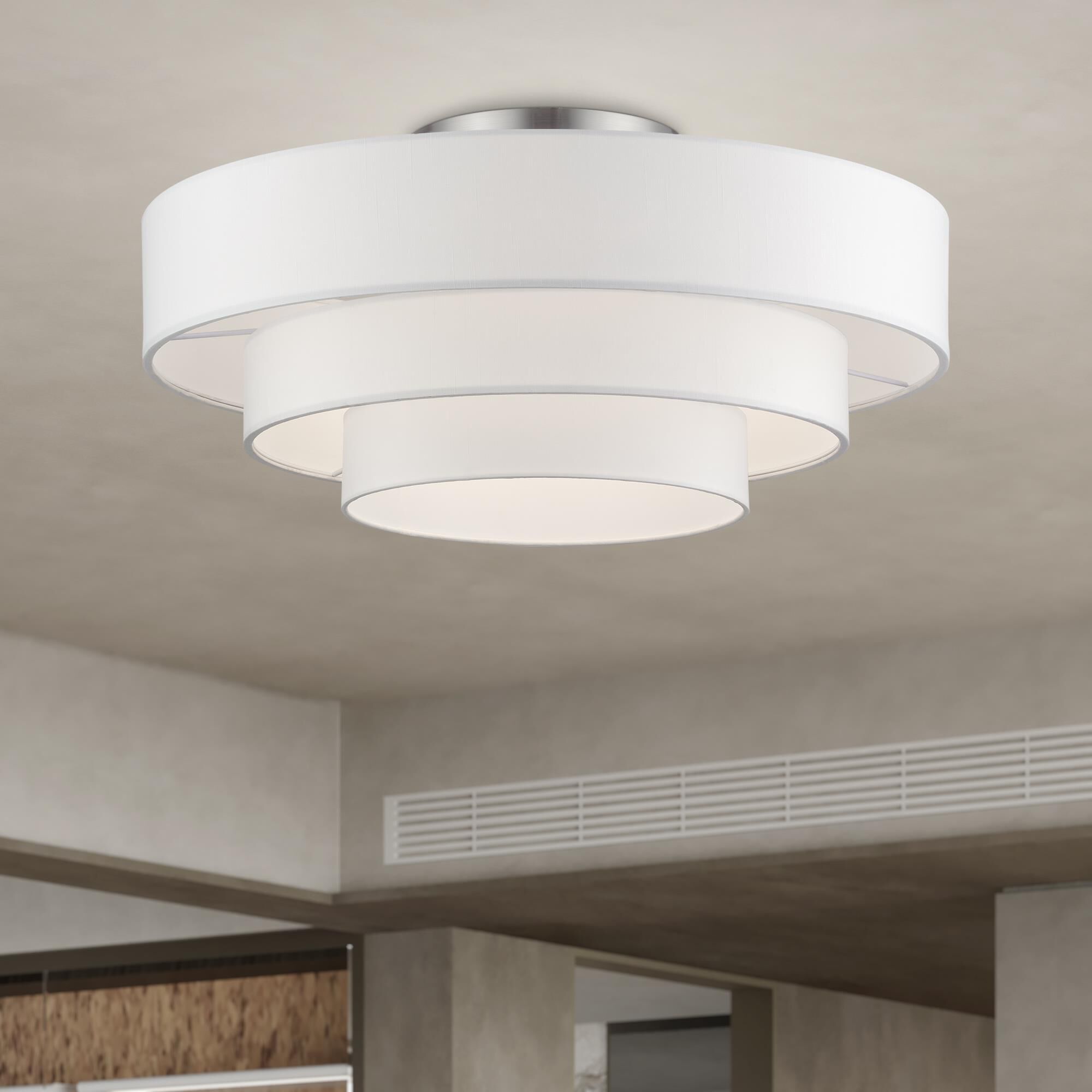 Shown in Brushed Nickel finish and Hand Crafted Off-White Fabric Hardbacks with White Fabric Inside shade