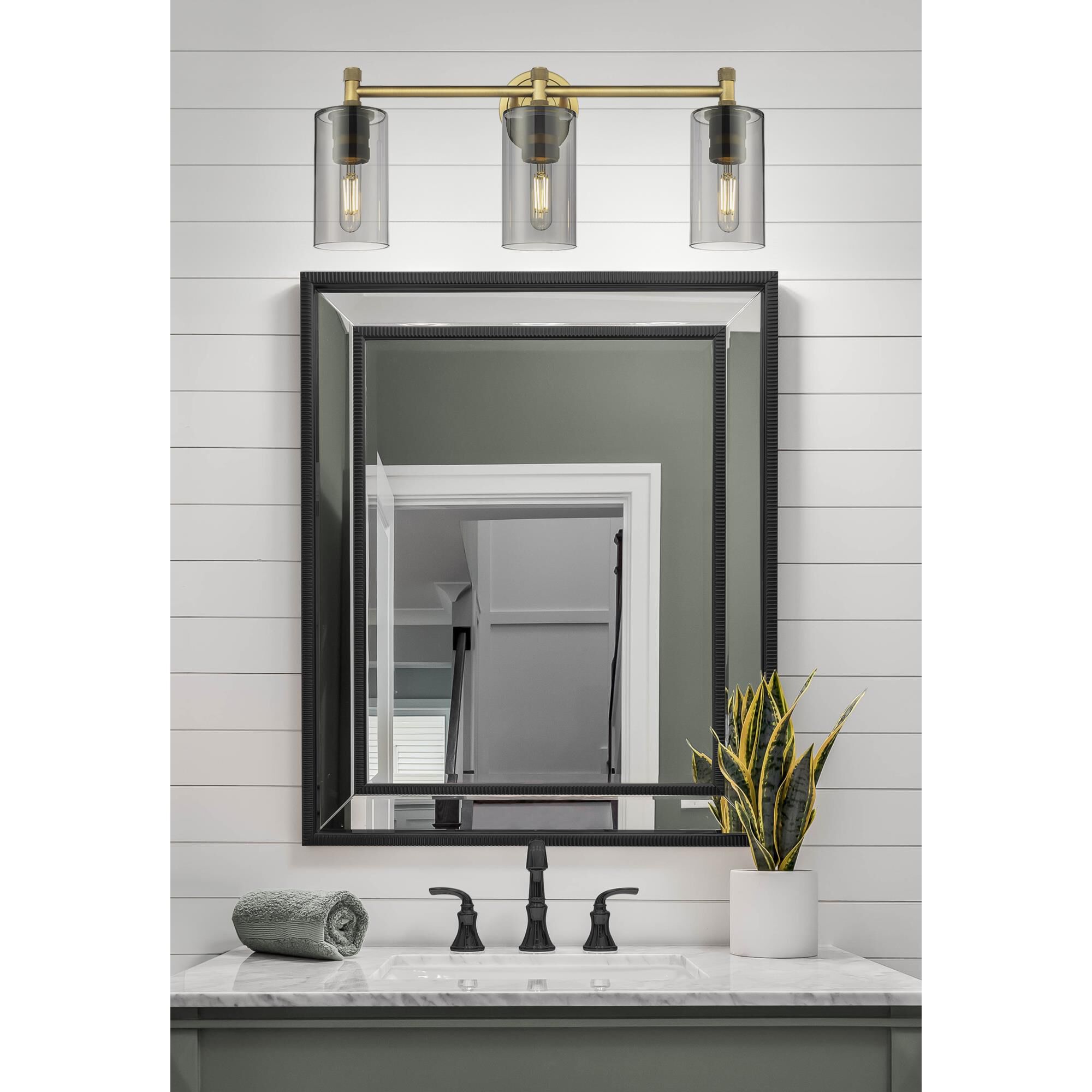 Shown in Brushed Brass finish and Plated Smoke glass