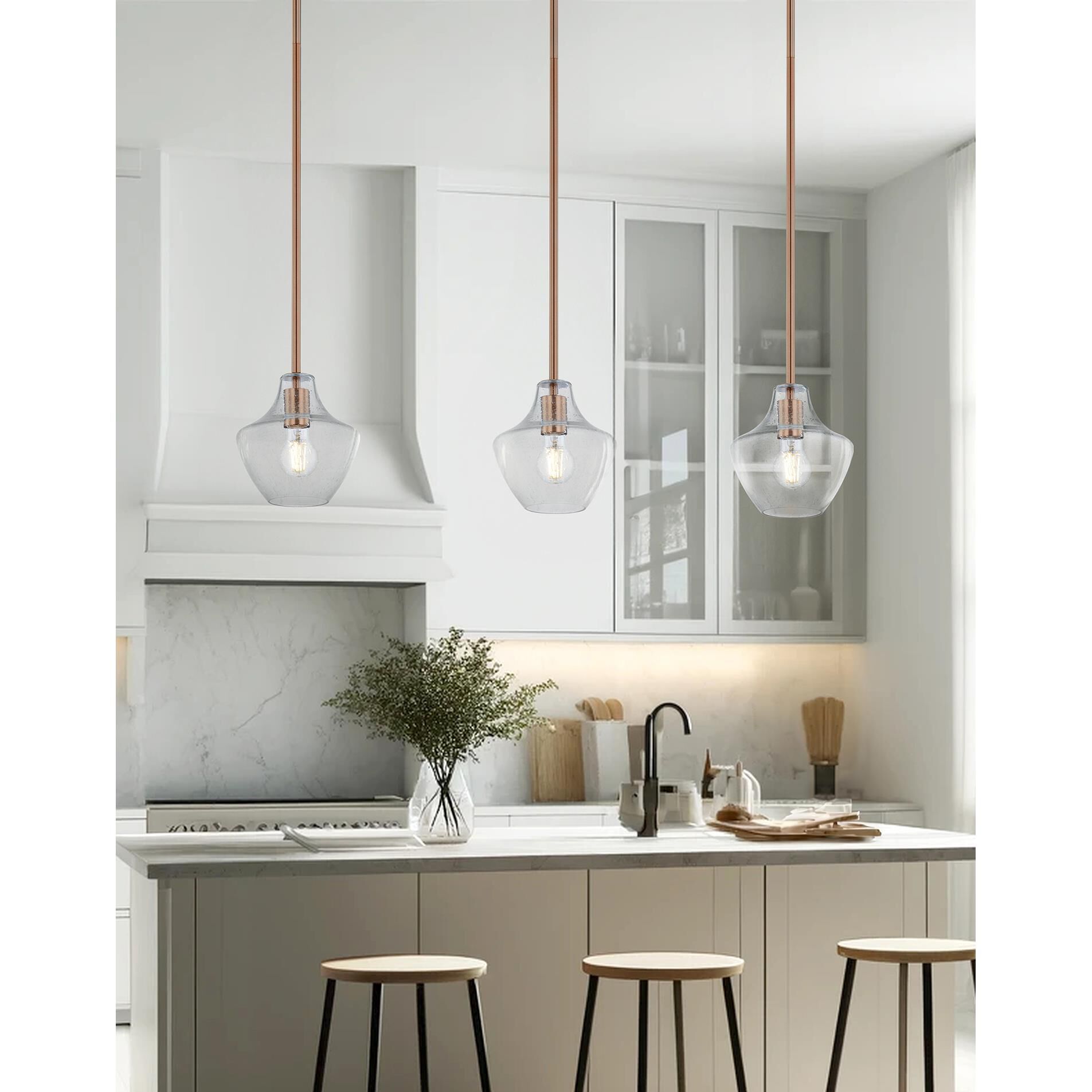 Shown in Brushed Brass finish and Seeded glass